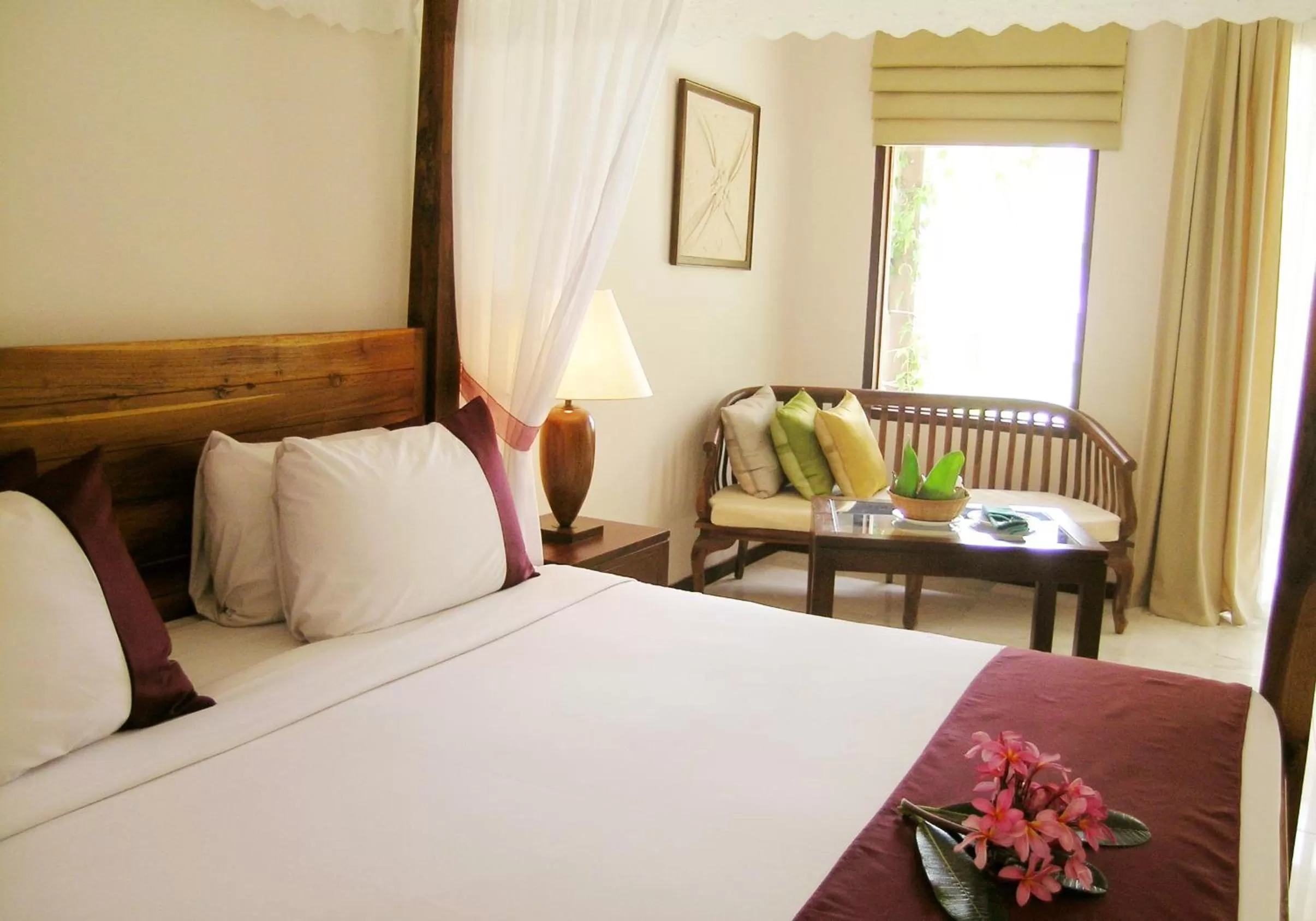 Bed in Frangipani Langkawi Resort