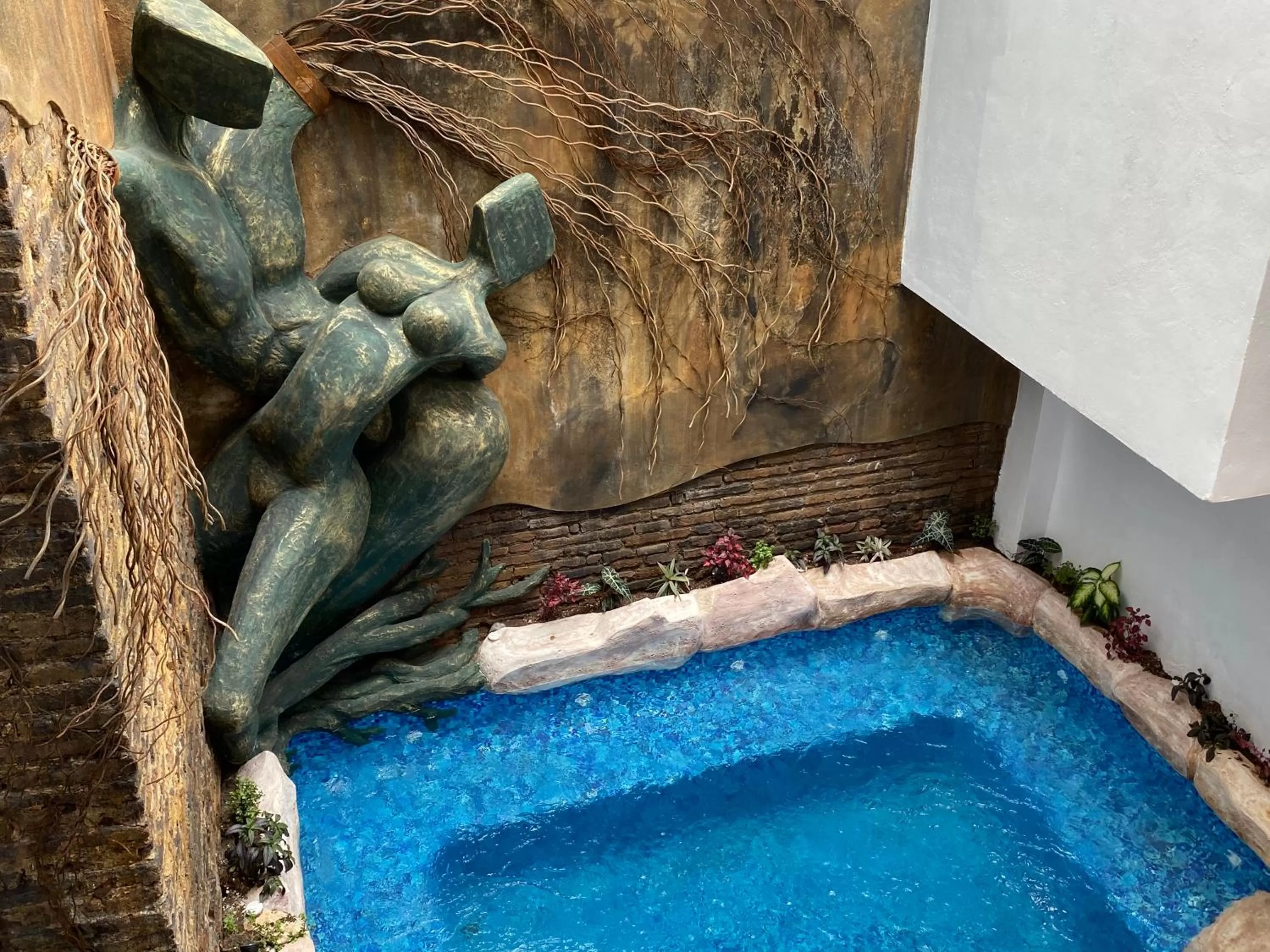 Swimming pool in Hotel Raices de Mar