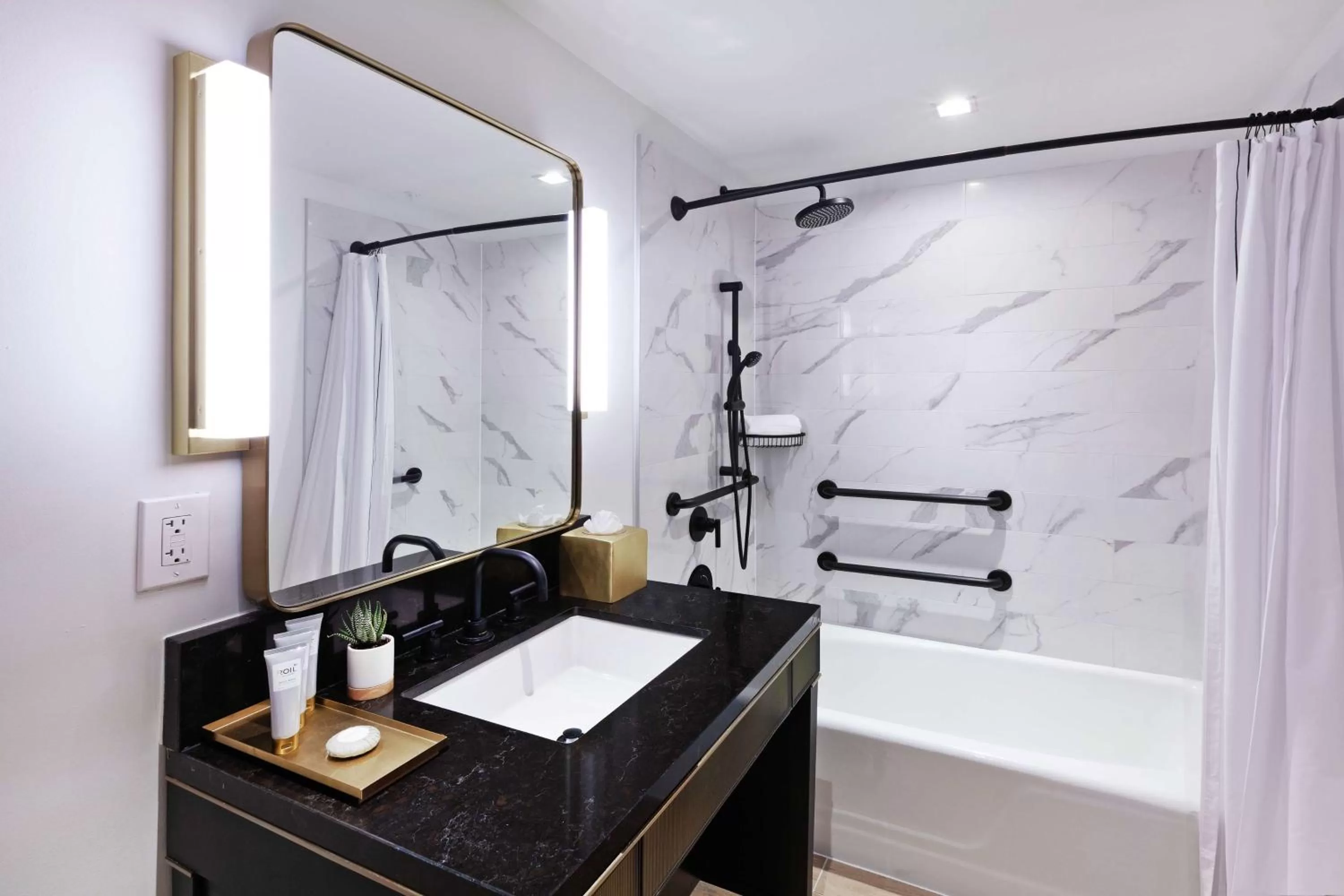 Bathroom in C. Baldwin, Curio Collection by Hilton