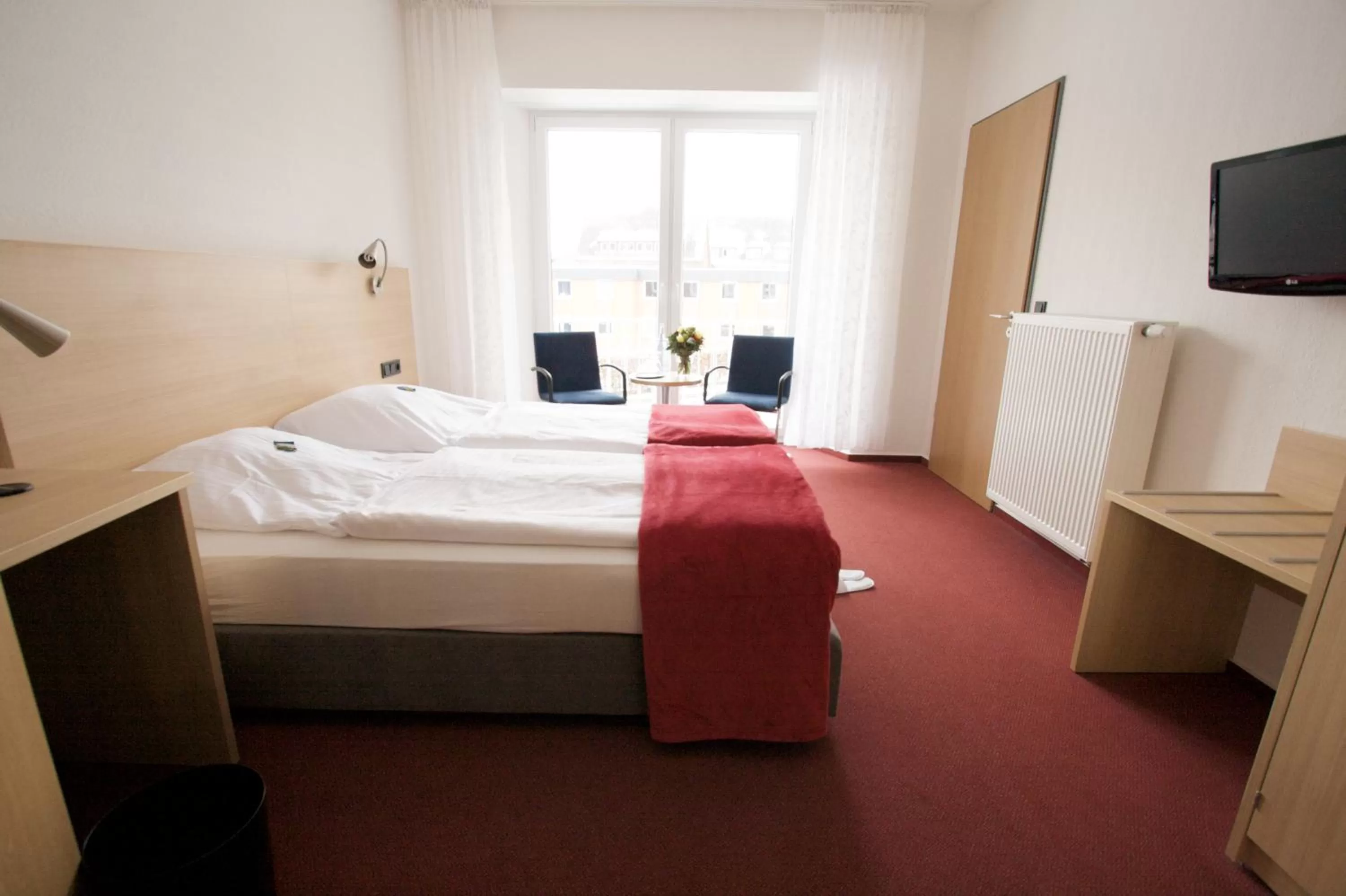 Photo of the whole room, Bed in Hotel Haus vom Guten Hirten