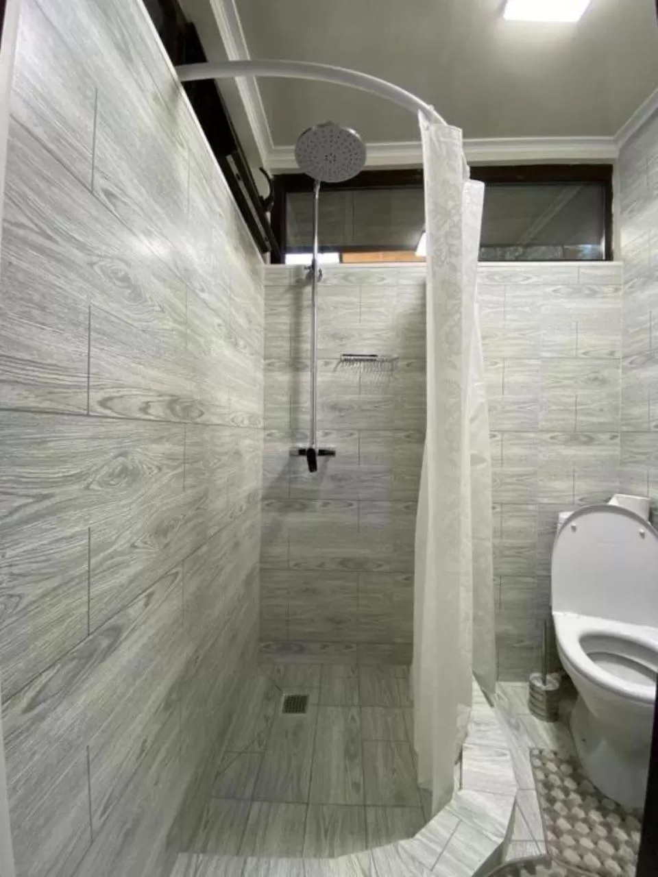 Bathroom in Kausar Hotel