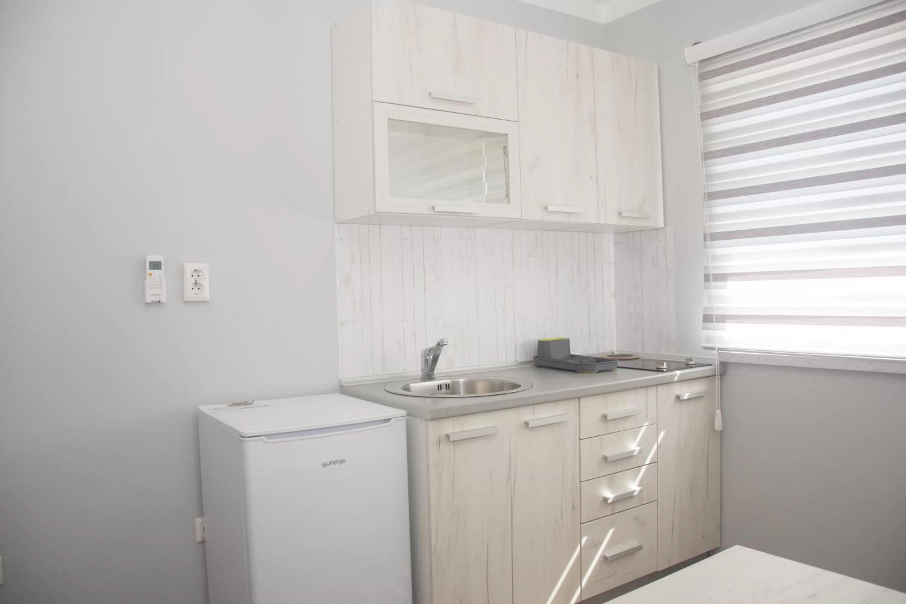 Kitchen/Kitchenette in Motel Aura