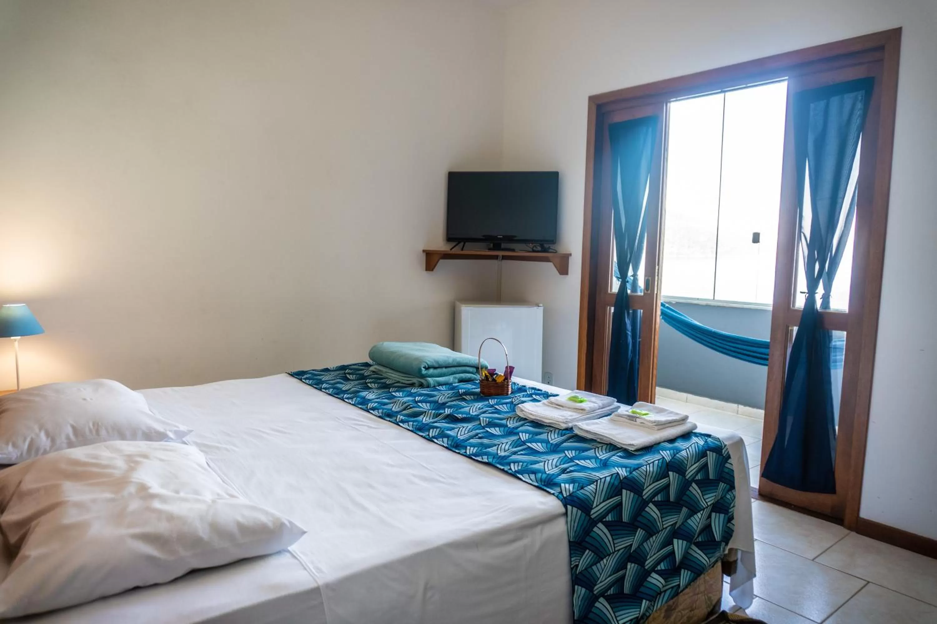 Bed in Pousada Piquara