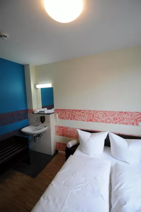 Photo of the whole room, Bed in HOLI-Berlin Hotel