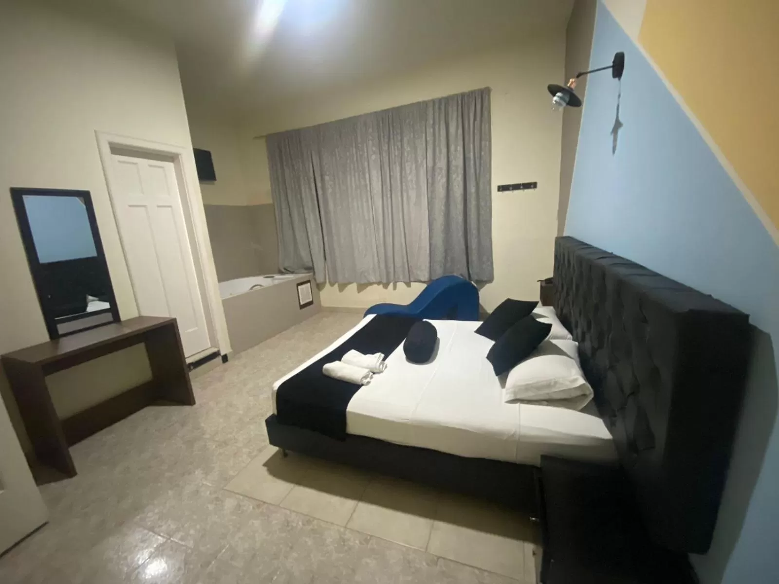 Bed in HOTEL CALLE REAL SUITE