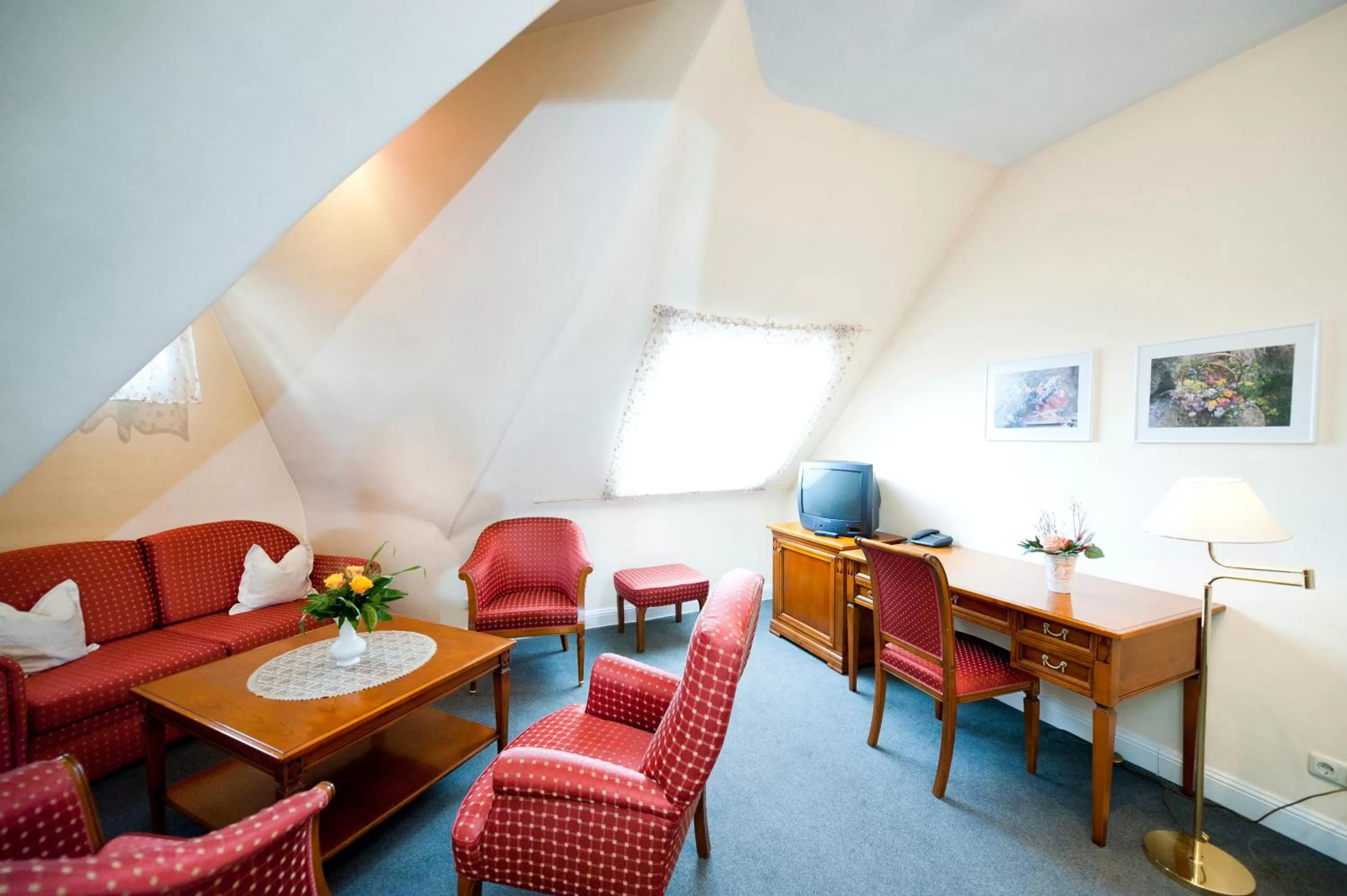 Communal lounge/ TV room in Hotel Spöttel