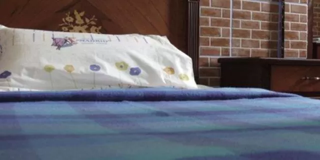 Bed in Hostal Suites Madrid