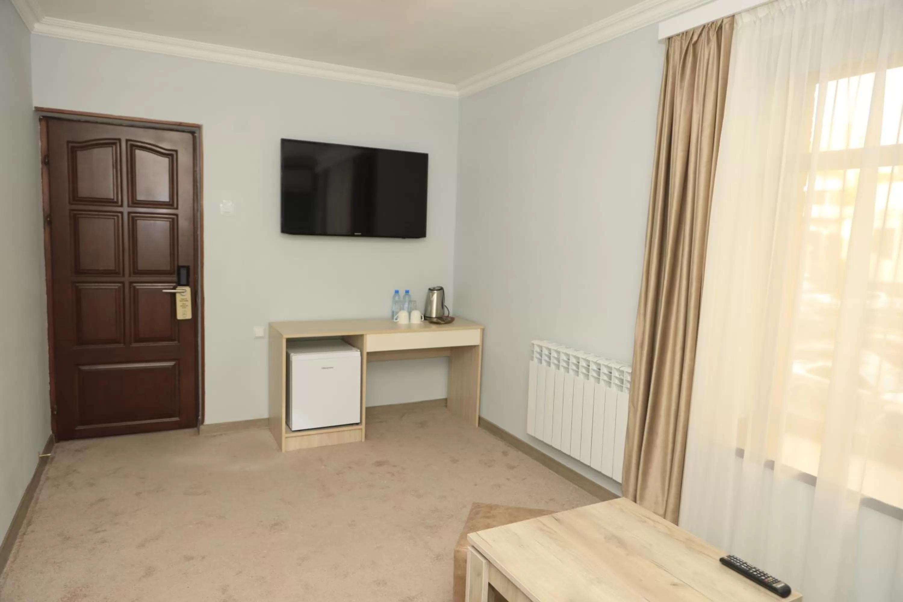 TV and multimedia, TV/Entertainment Center in DeLin Hotel And Tours