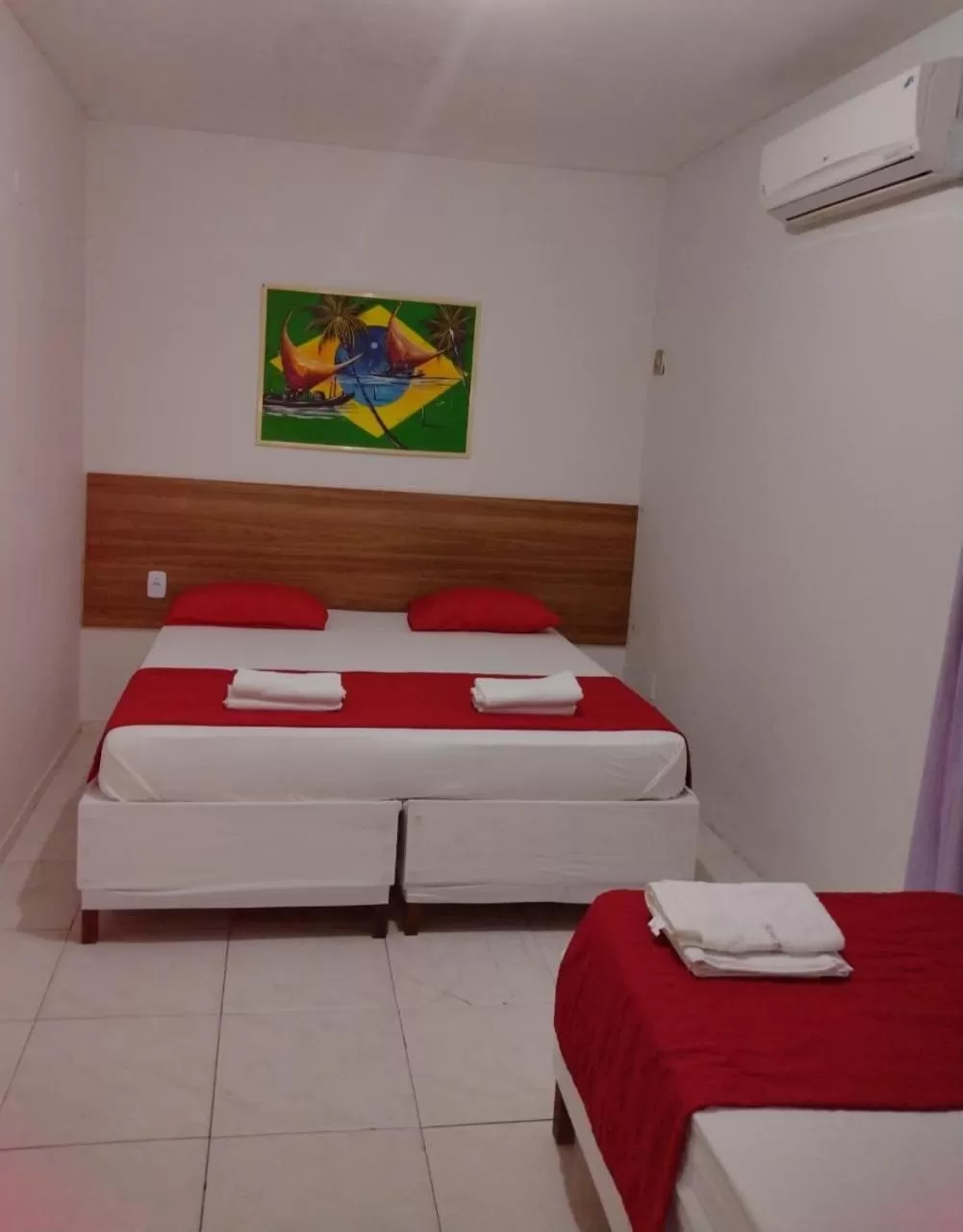 Bed in Nalu Beach Hotel pousada