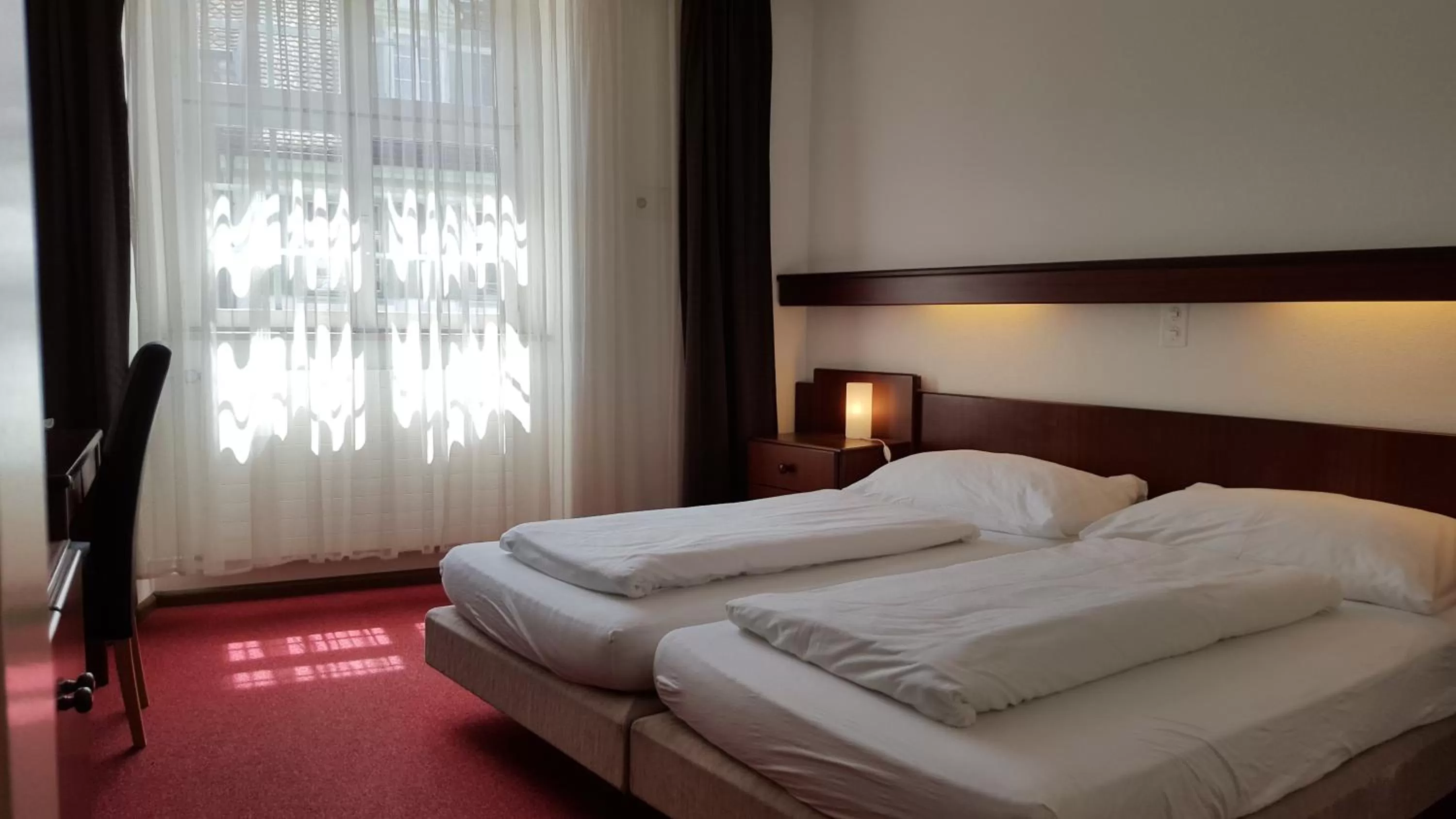 Bed in Spalenbrunnen Hotel & Restaurant Basel City Center