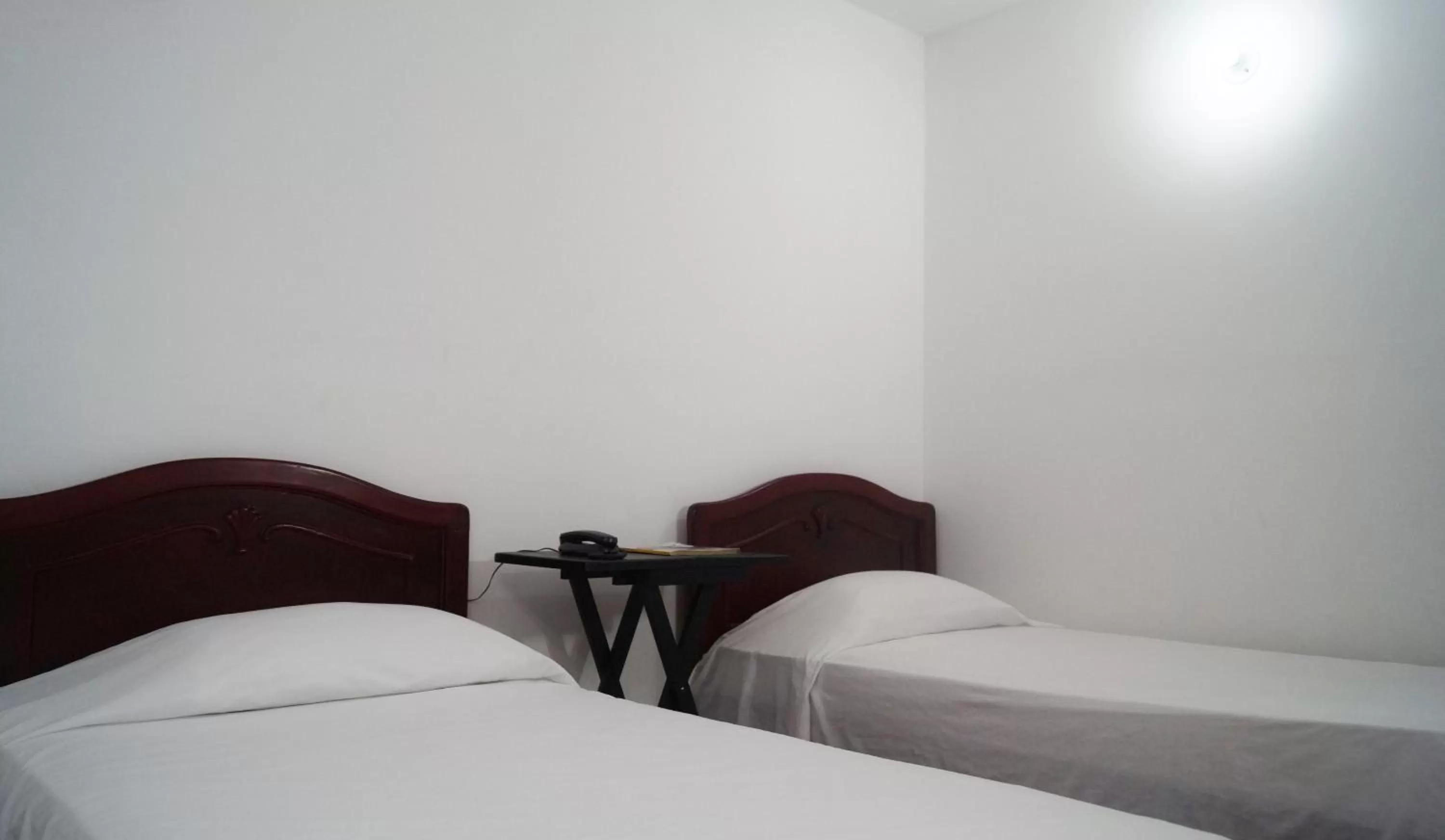 Bed, Room Photo in Hotel Comercial