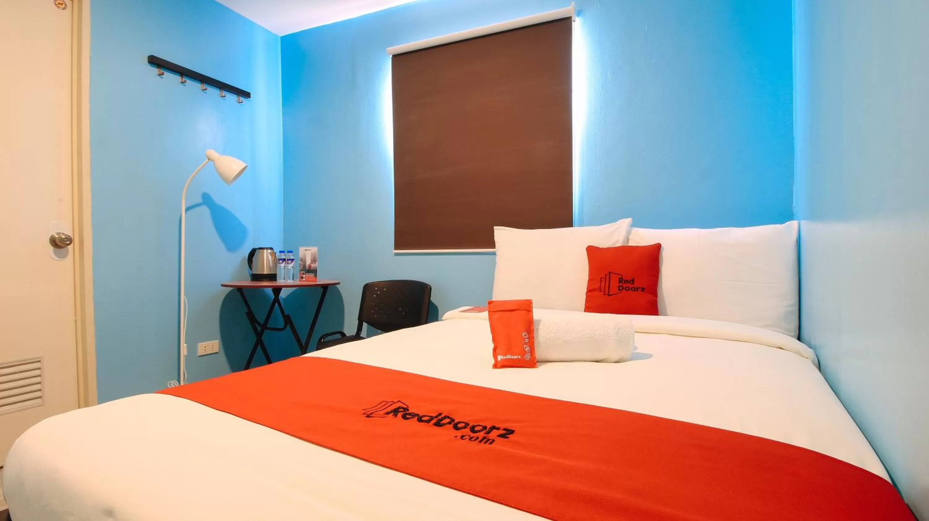 Photo of the whole room, Bed in RedDoorz at Hotel Rosemarie