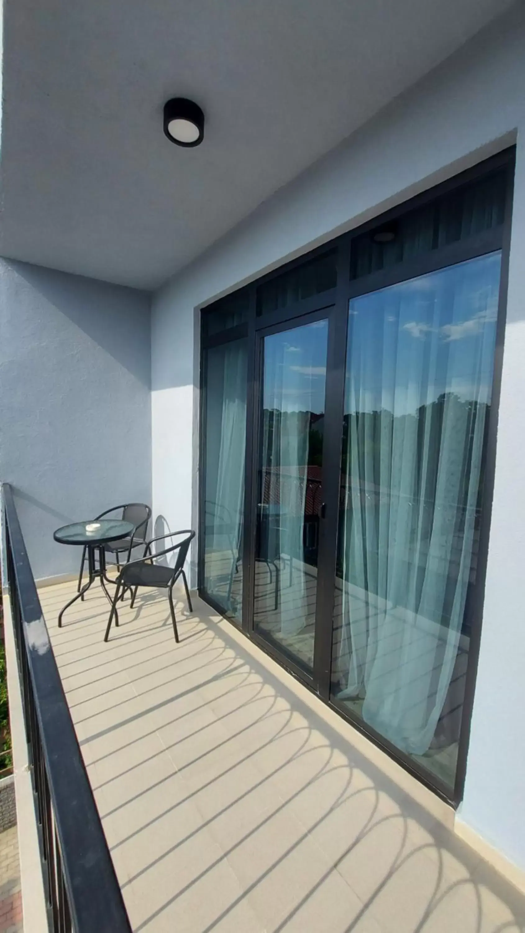 Triple Room with Balcony in Level Up Hotel & Restaurant Triple Room with Balcony in Level Up Hotel & Restaurant