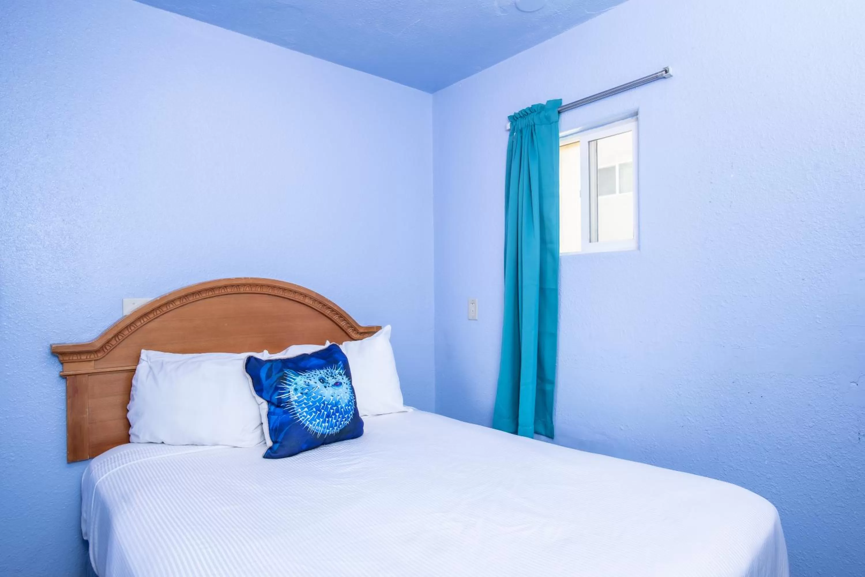 Bed in Aqua Breeze Inn