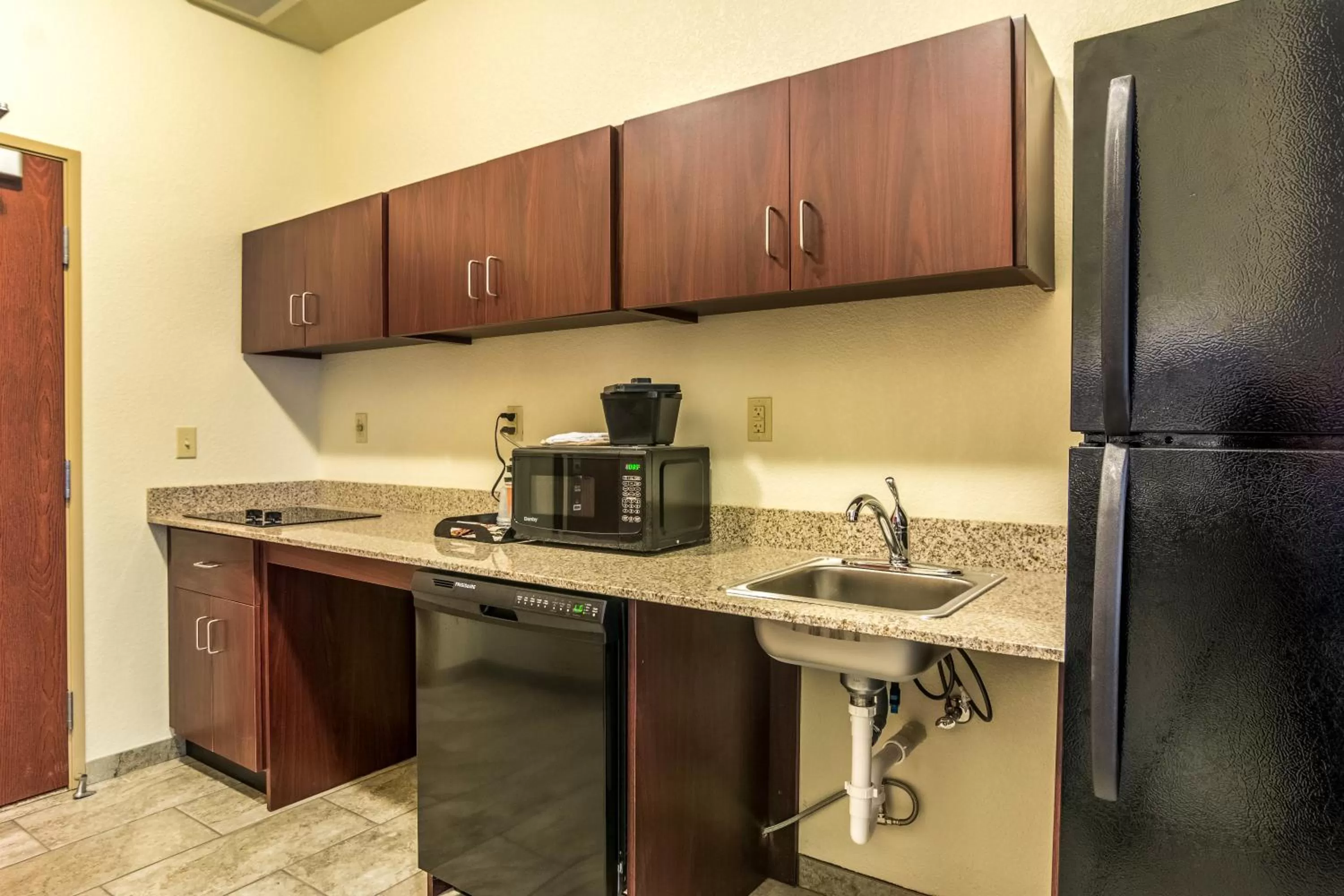 Kitchen or kitchenette in Cobblestone Hotel & Suites - Torrington
