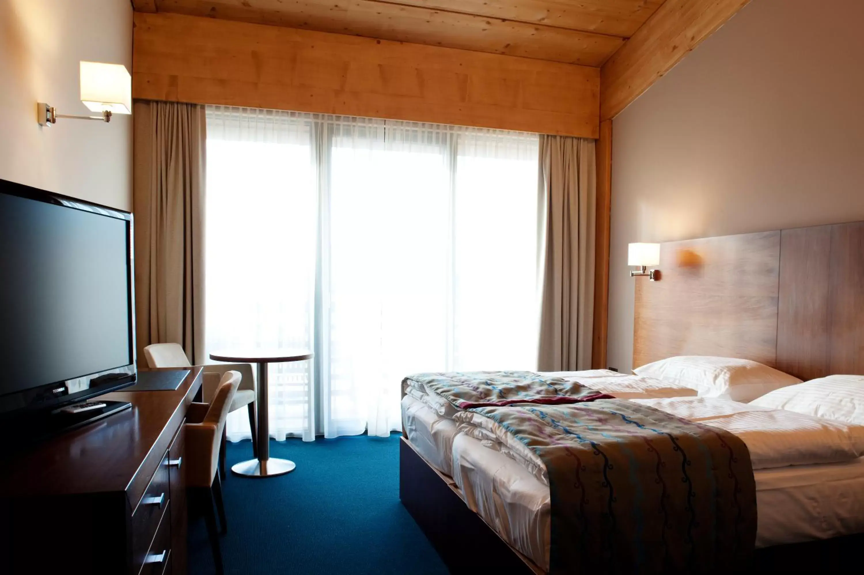 Deluxe Double or Twin Room with Balcony and Aquapark Included in Bohinj Eco Hotel Deluxe Double or Twin Room with Balcony and Aquapark Included in Bohinj Eco Hotel