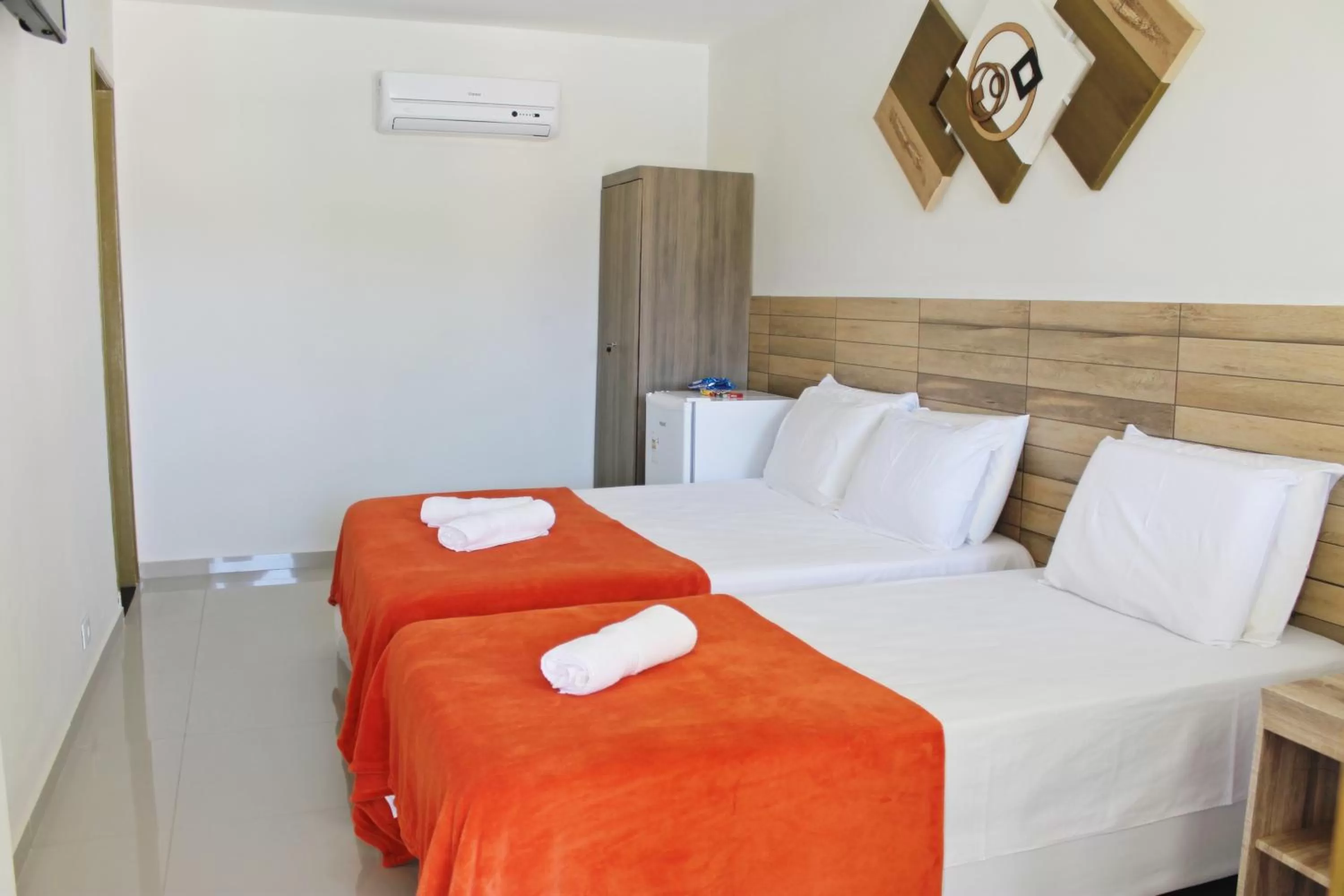 Bed in Pousada Das Palmeiras