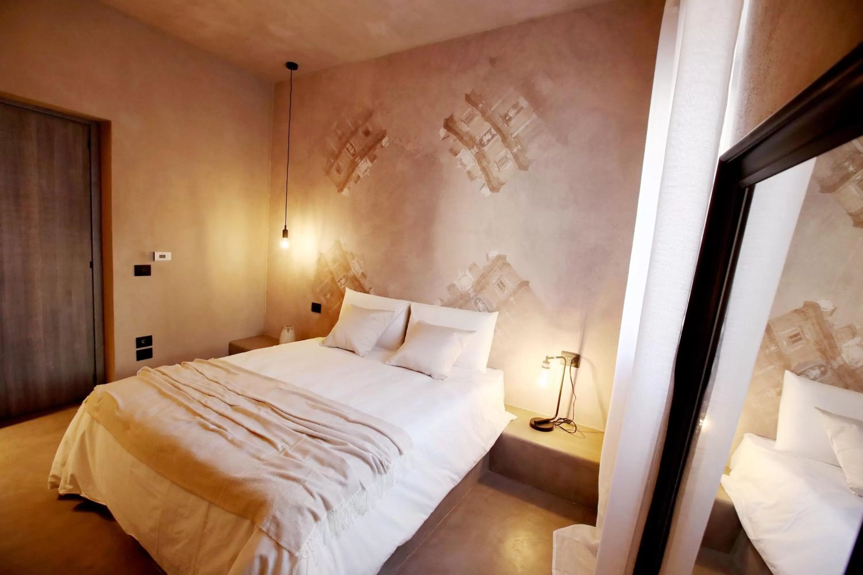 Bed in Casa Nostra Luxury Suites & Spa