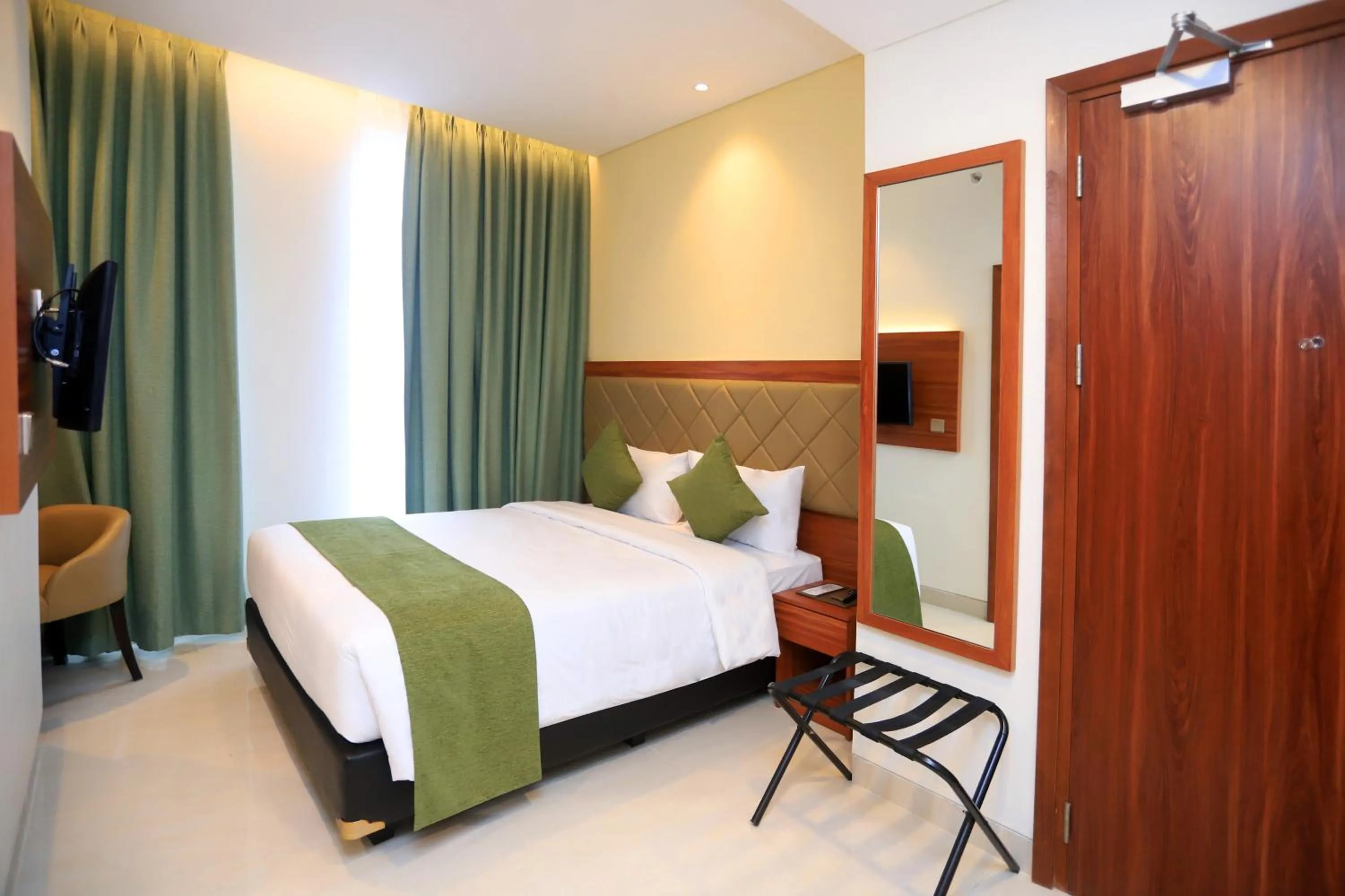 Bed in Luxury Inn Arion Hotel