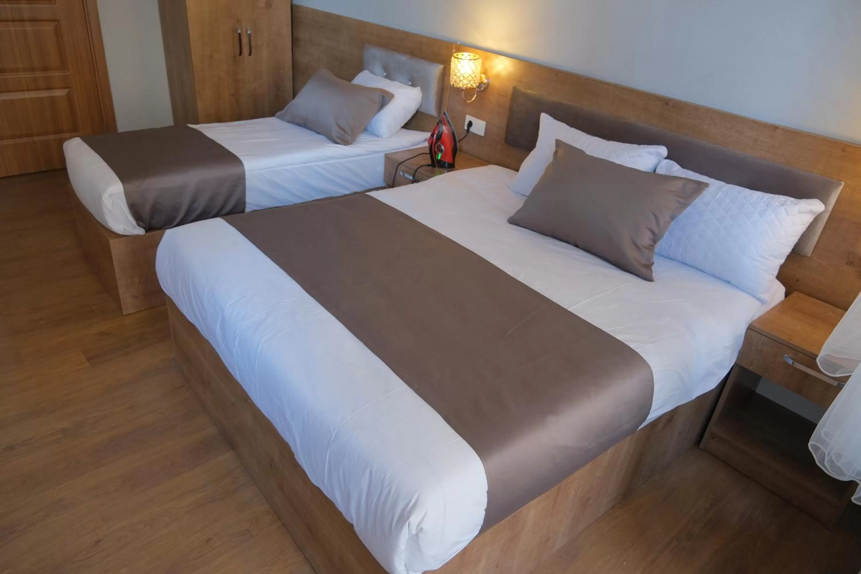 Bed in Adamantides Hotel