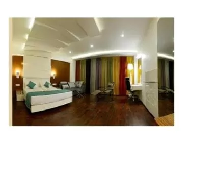 Photo of the whole room, Bed in Hotel Vijay Elanza