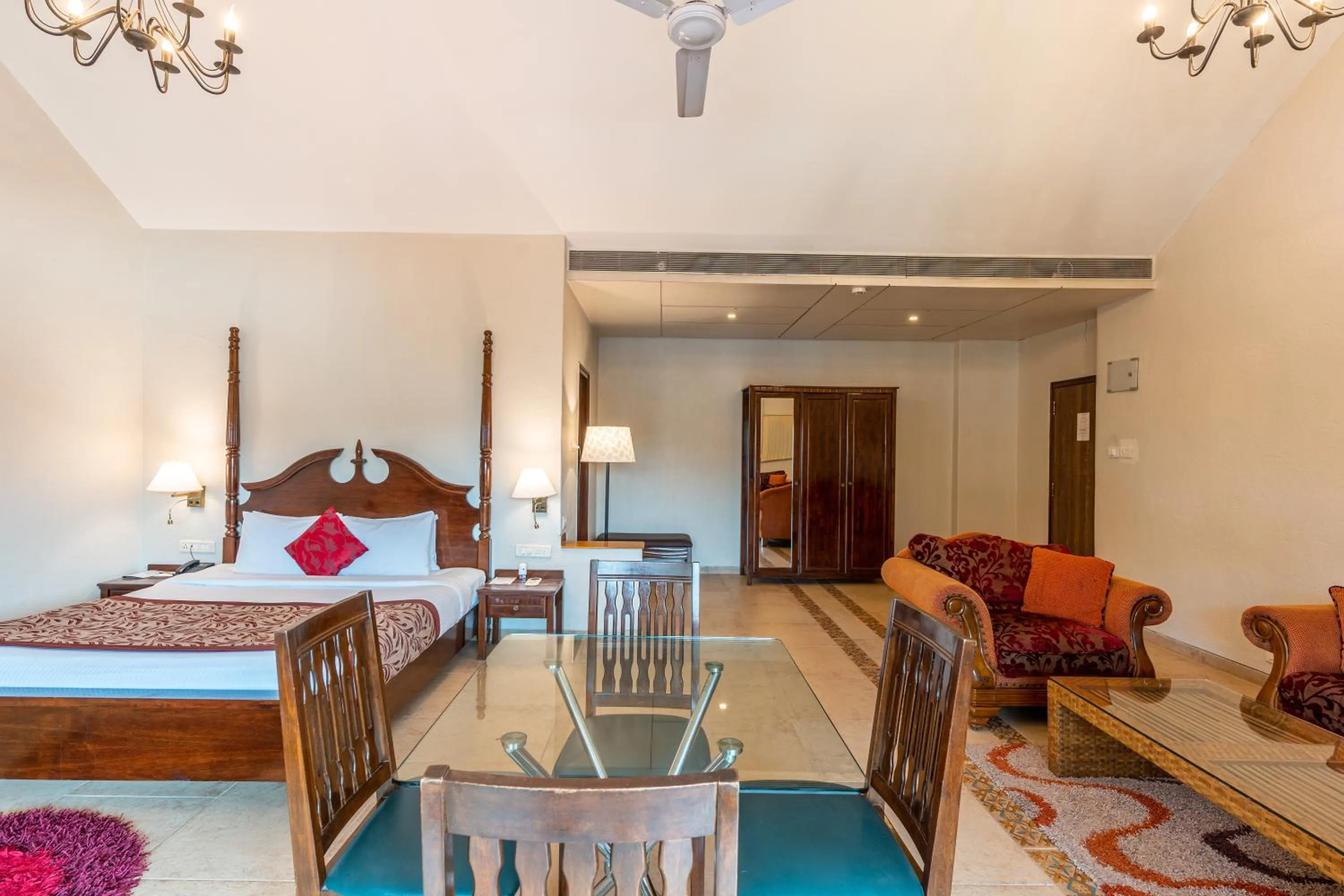 Living room, Bed in Neelam's The Grand Hotel Goa