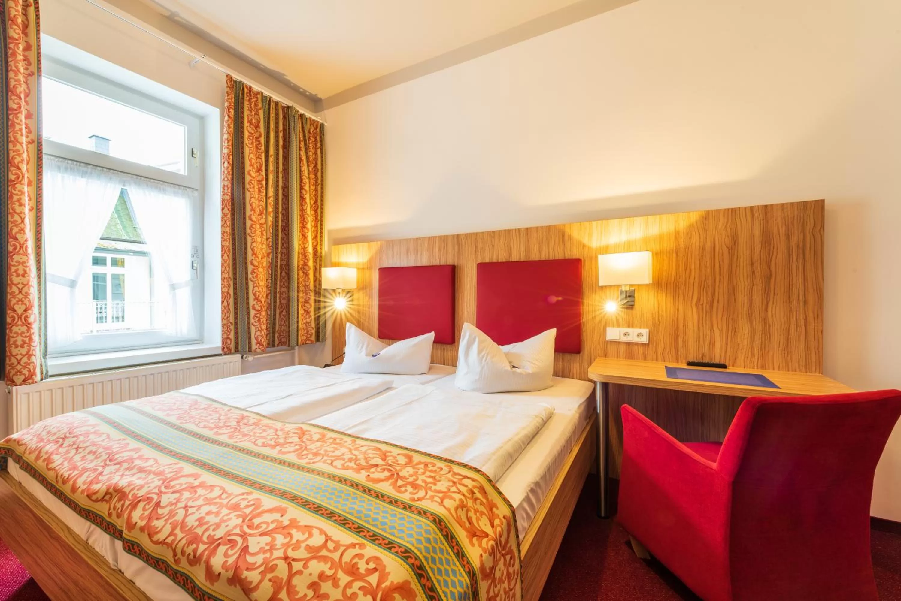 Photo of the whole room, Bed in Strandhotel zur Promenade