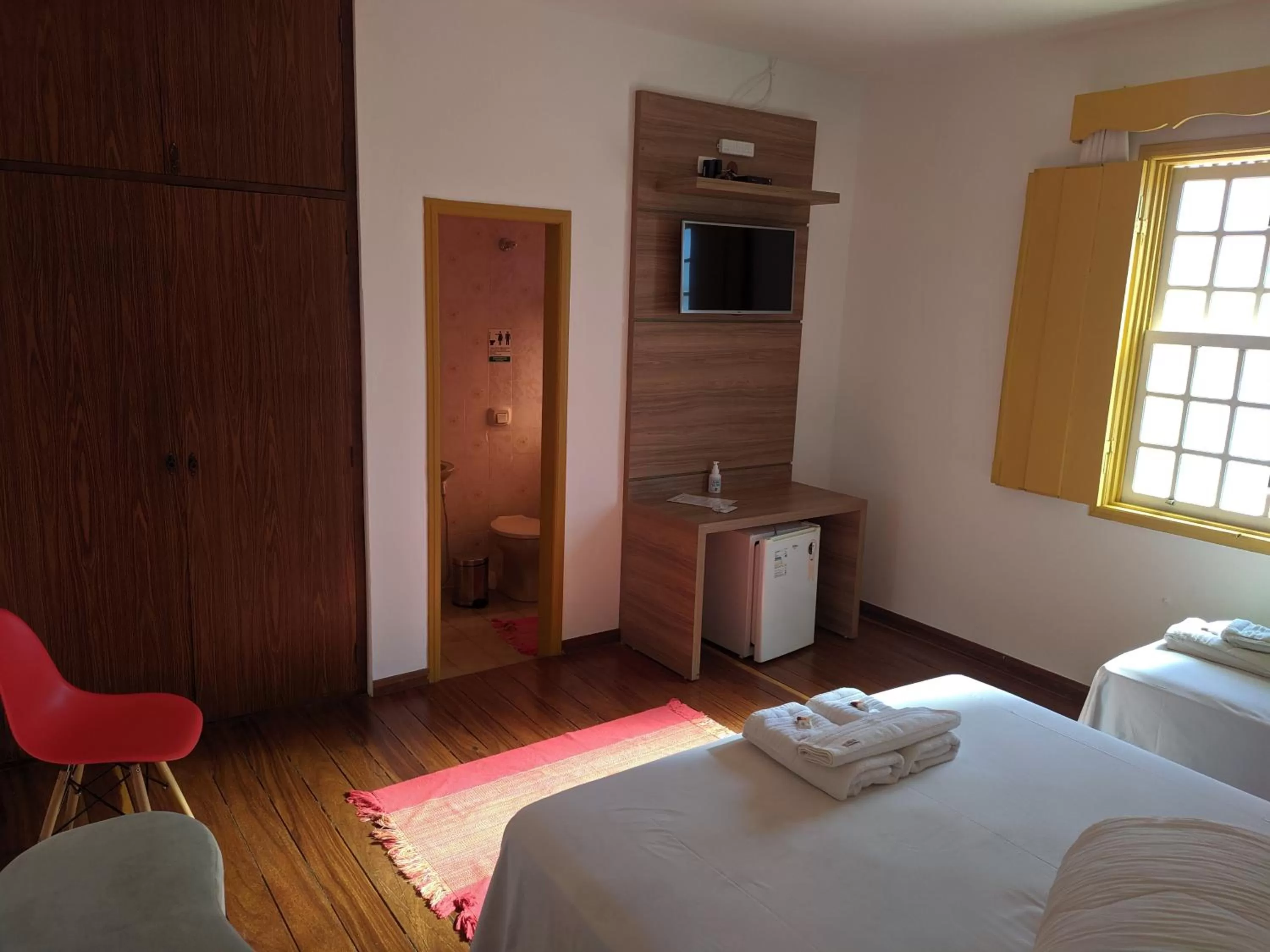 Bed in Pousada o Amanhecer