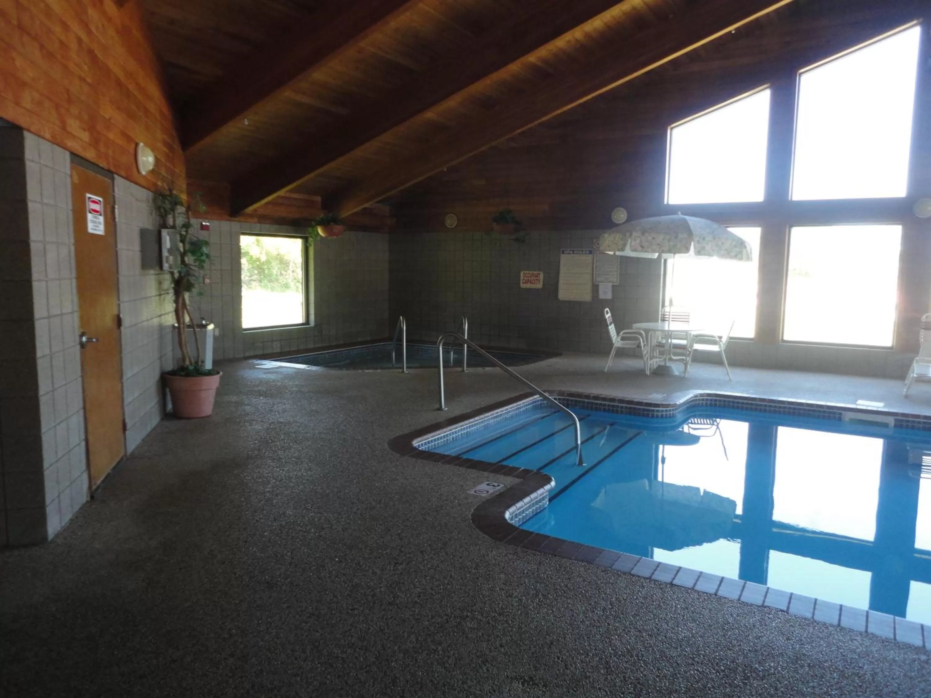 Swimming pool in AmericInn by Wyndham West Burlington