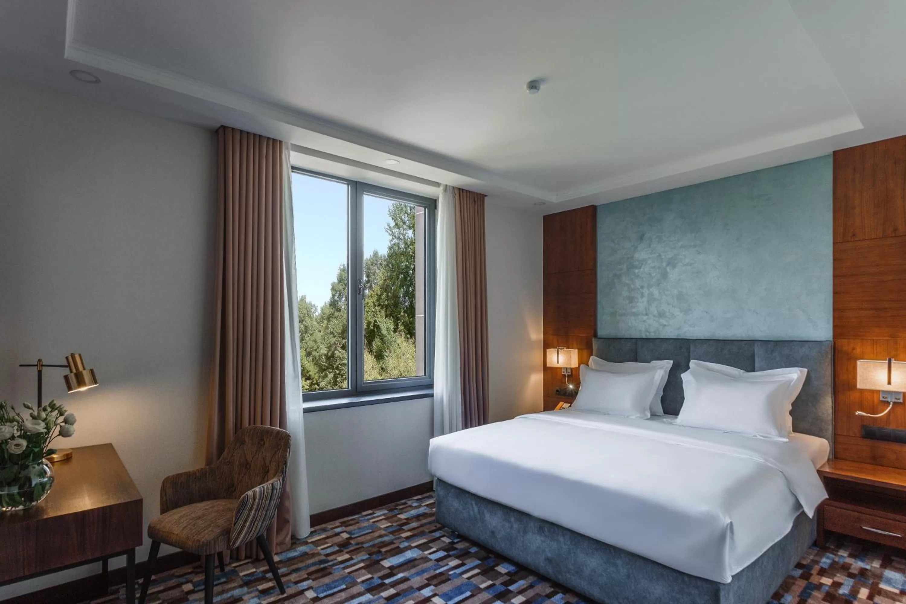 Photo of the whole room, Bed in ATECA Hotel Suites Tashkent