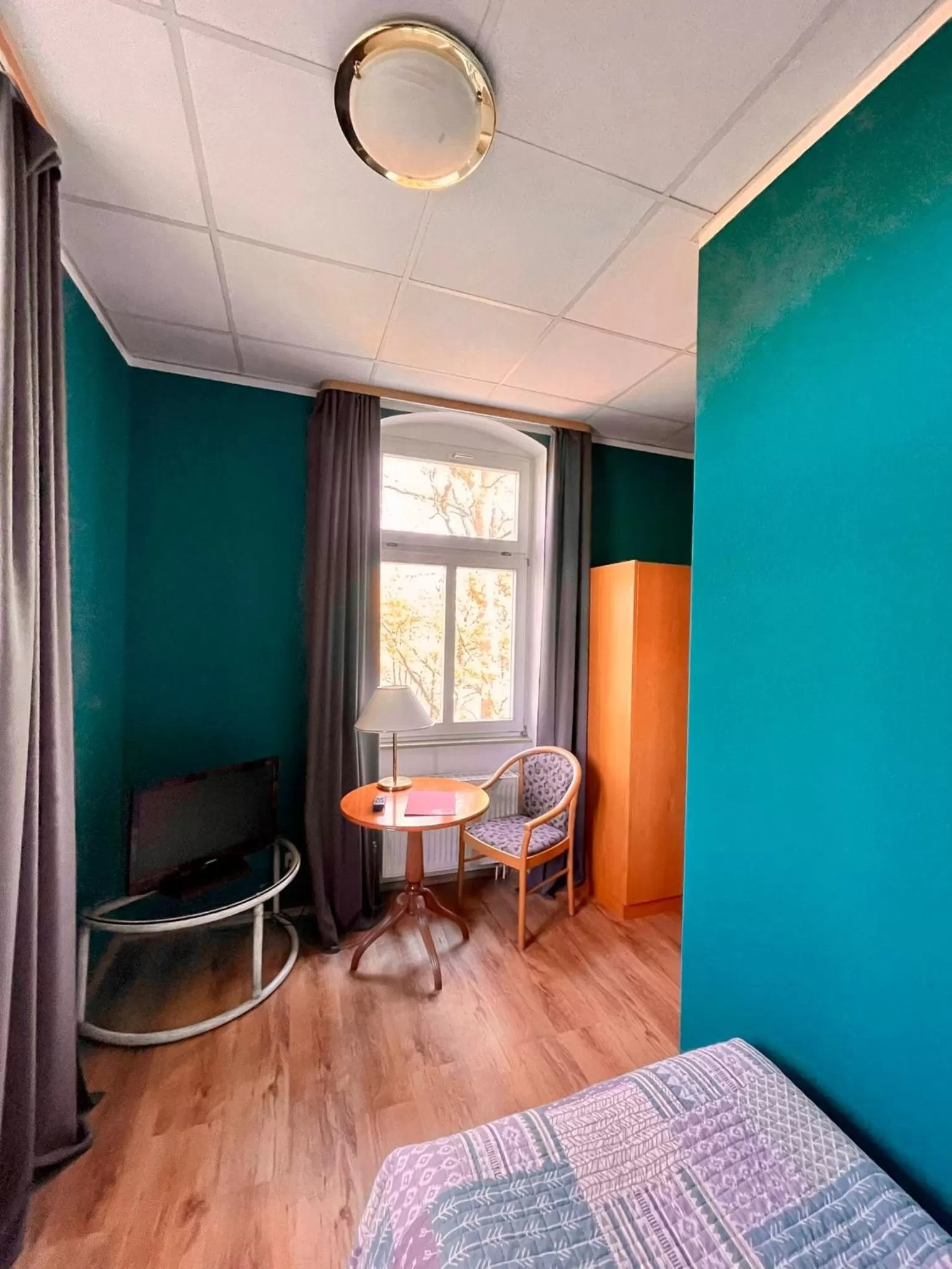 Seating area, Bed in Parkhotel Waldschlösschen