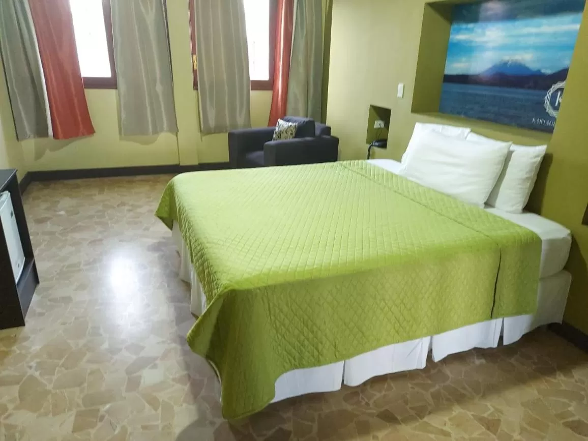 Bed in Kartagus Hotel