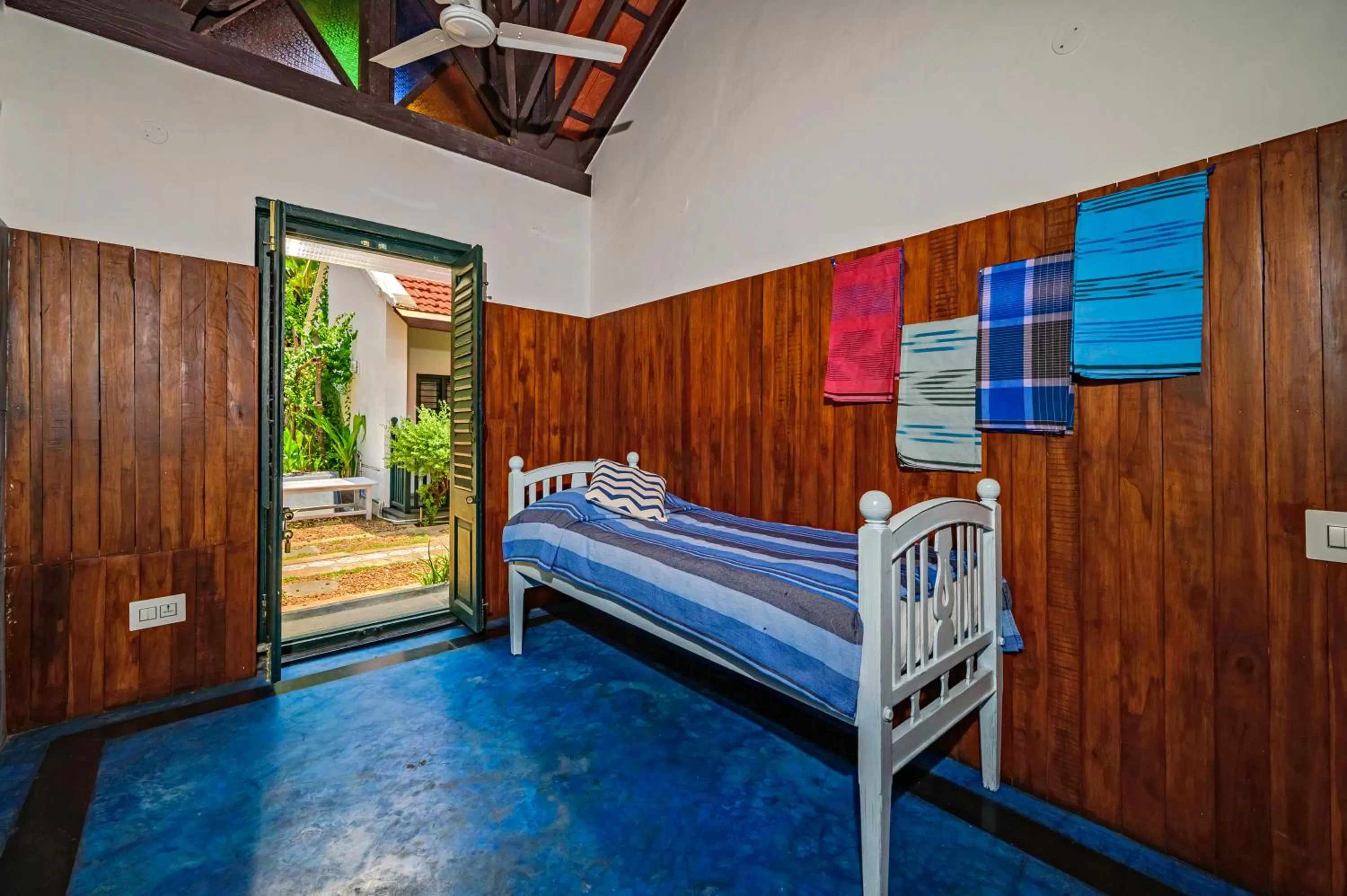 Bed in Neemrana's Coconut Alley