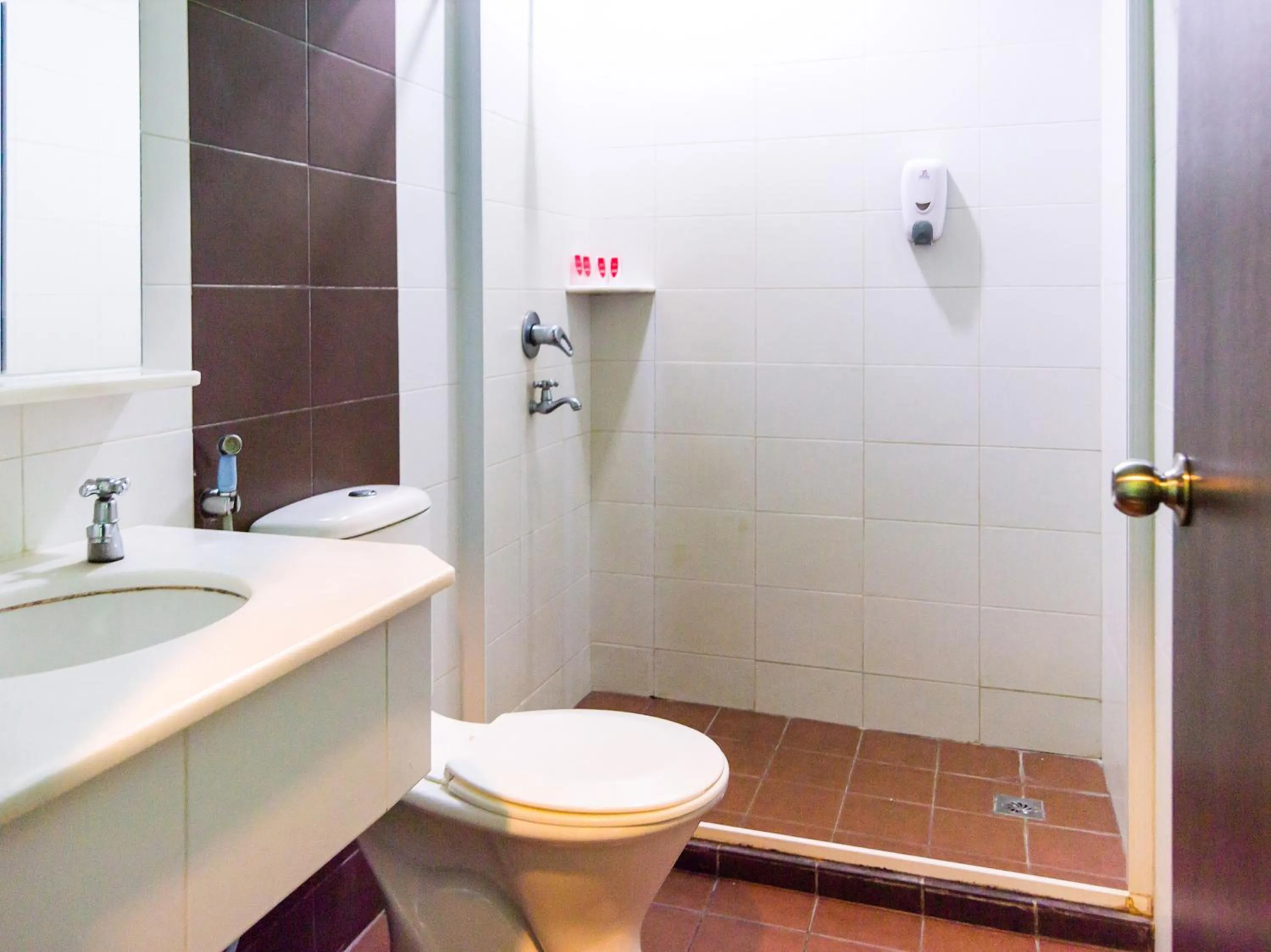 Bathroom in OYO 89408 Royal Hotel