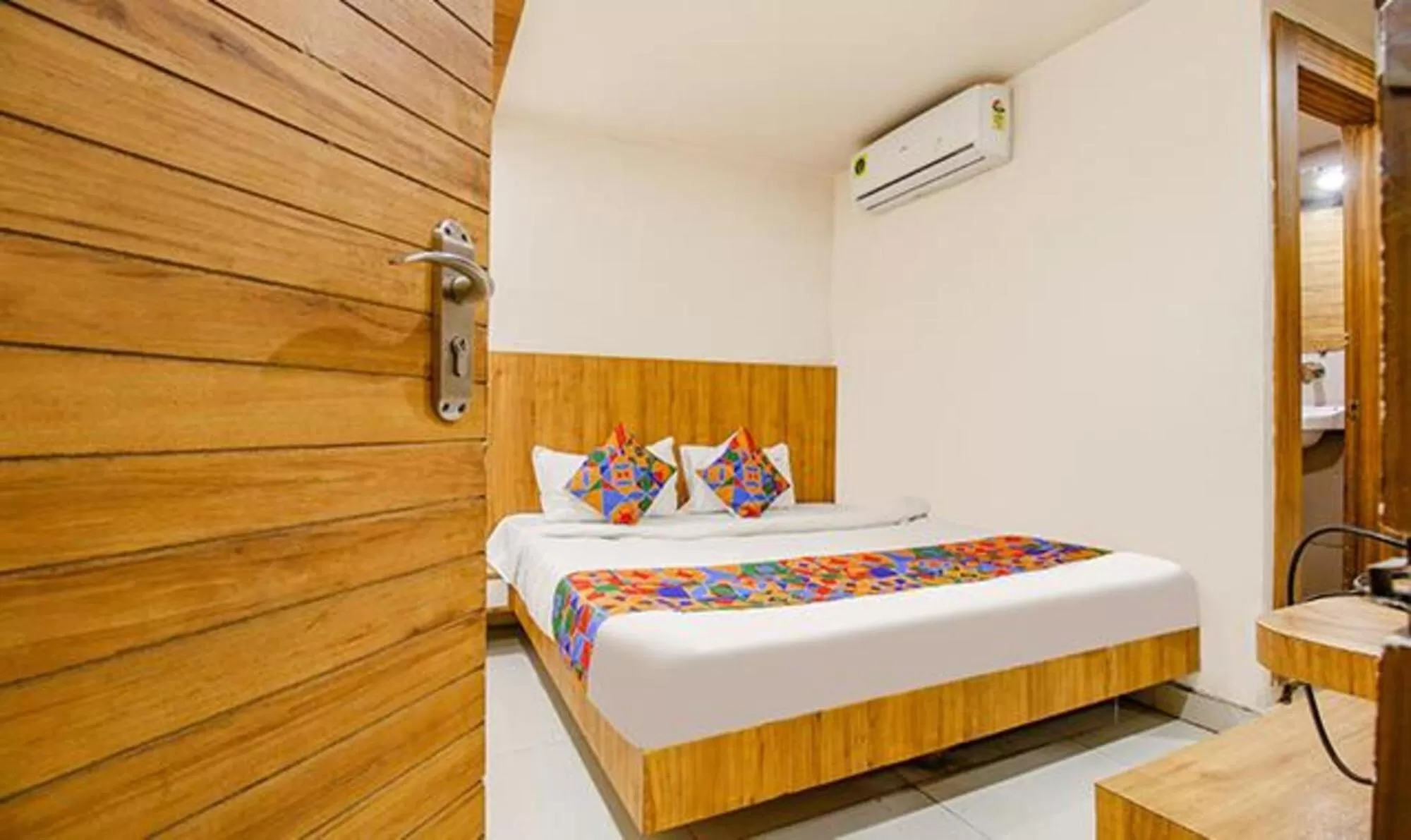 Photo of the whole room, Bed in FabExpress Sunshine Regency