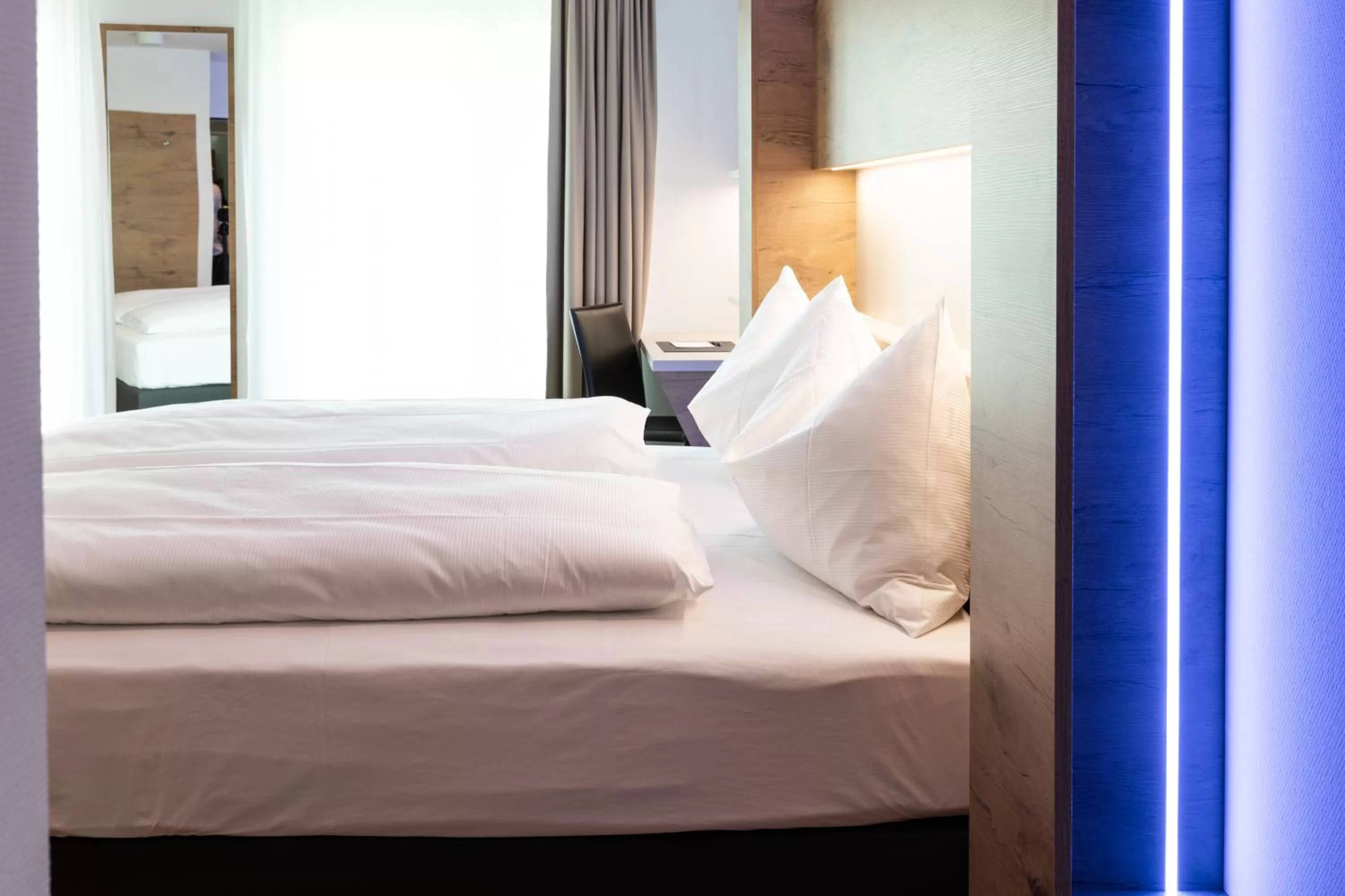 Photo of the whole room, Bed in TRIP INN JET HOTEL Zürich Airport