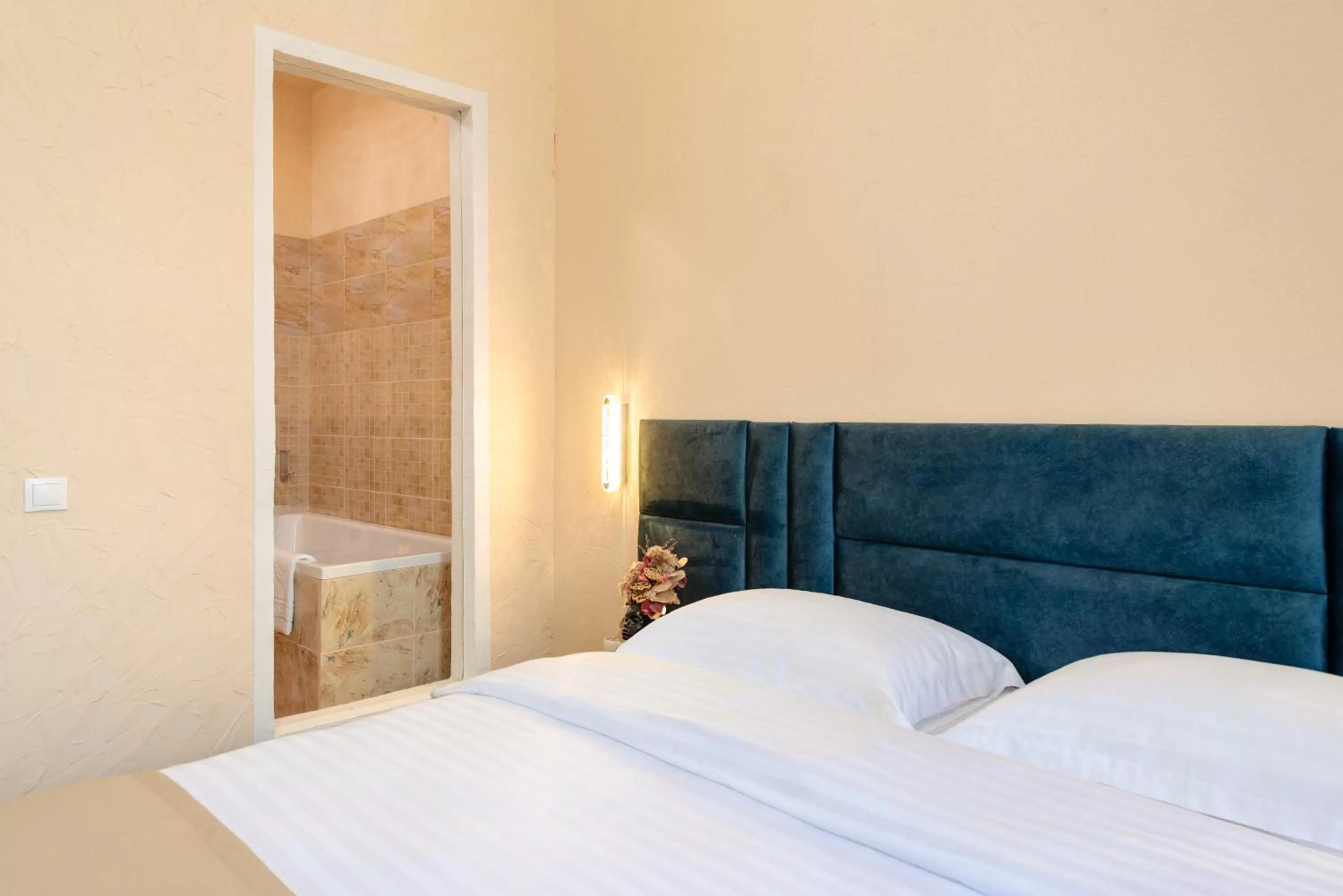 Bed in Palace Bulevard Inn