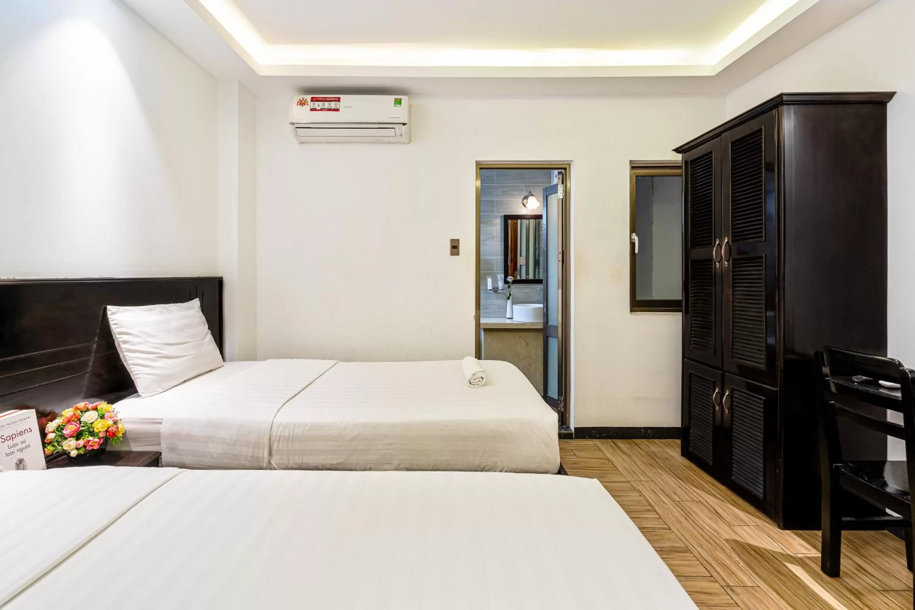 Bed in Lotus Laverne Hotel