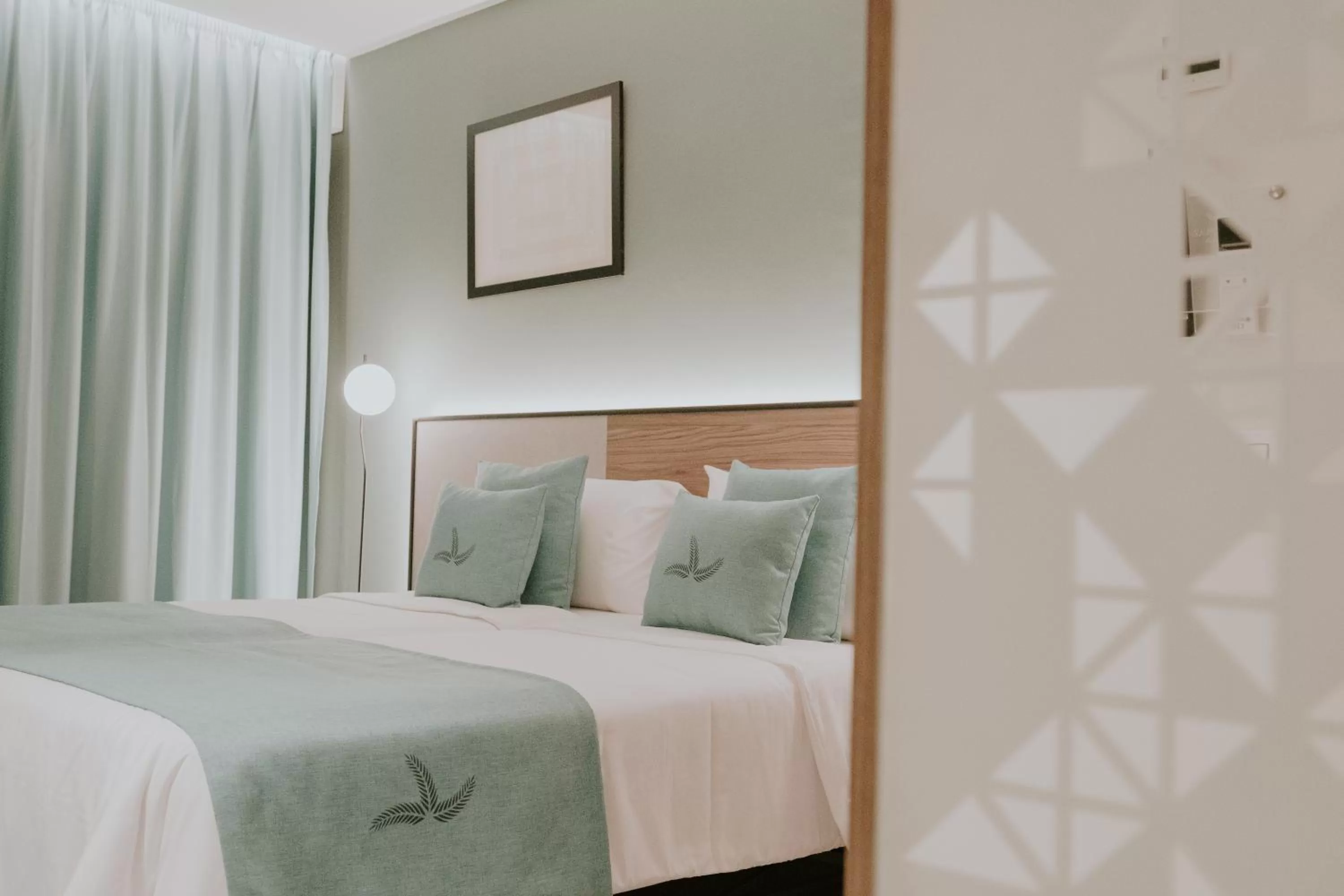 Bed in Catalina Plaza Hotel Sostenible