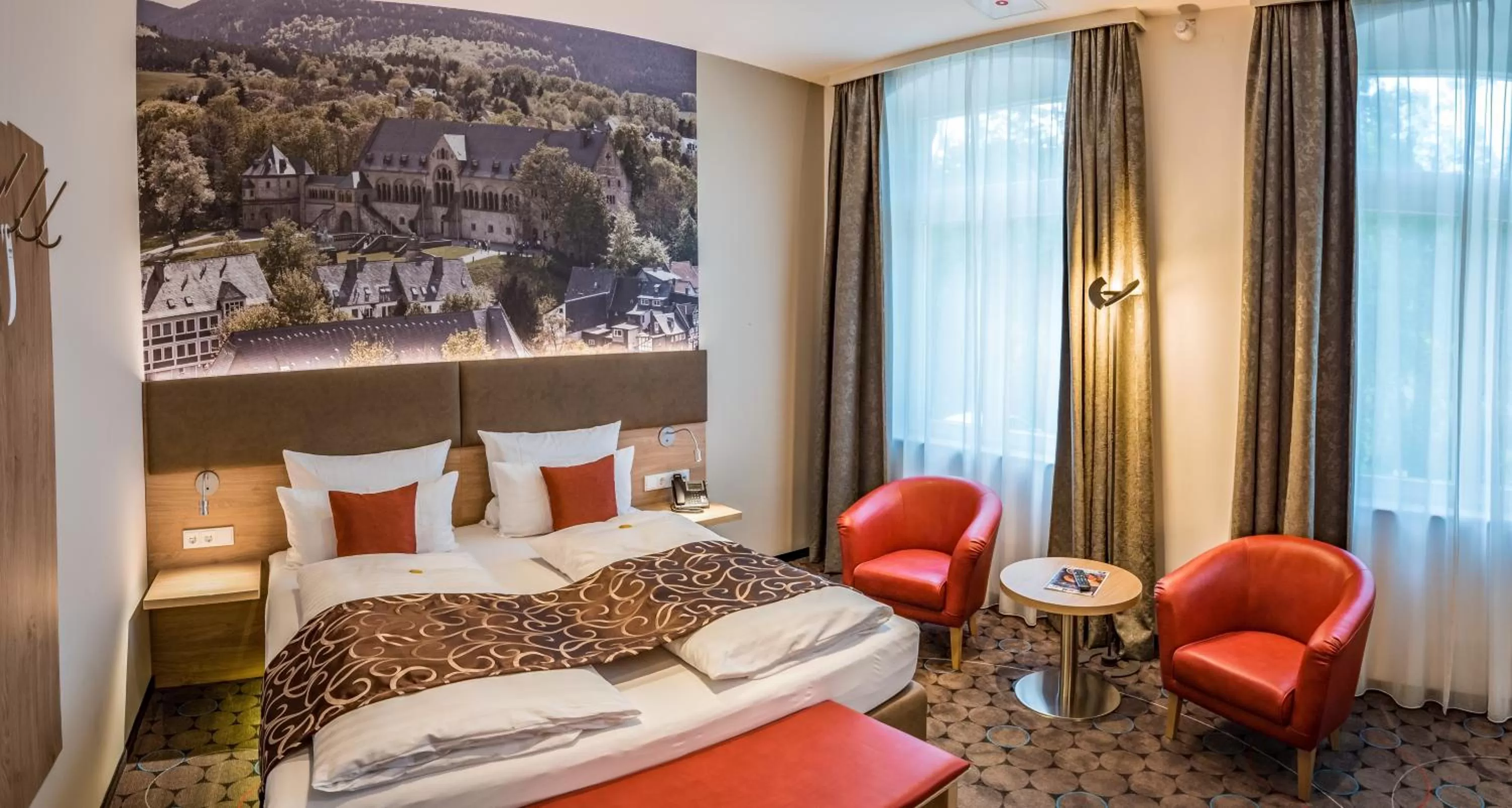 Photo of the whole room, Bed in AKZENT Hotel Villa Saxer