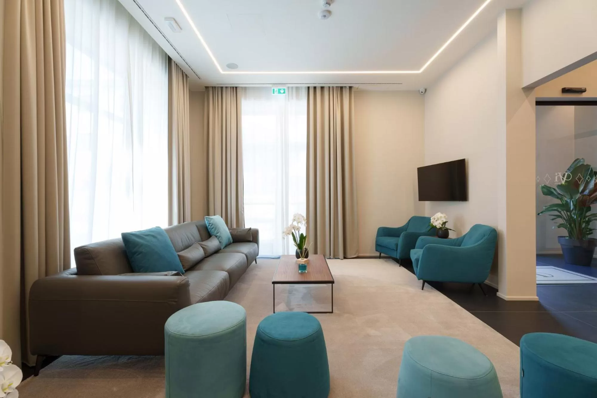 Communal lounge/ TV room in Vi Suites