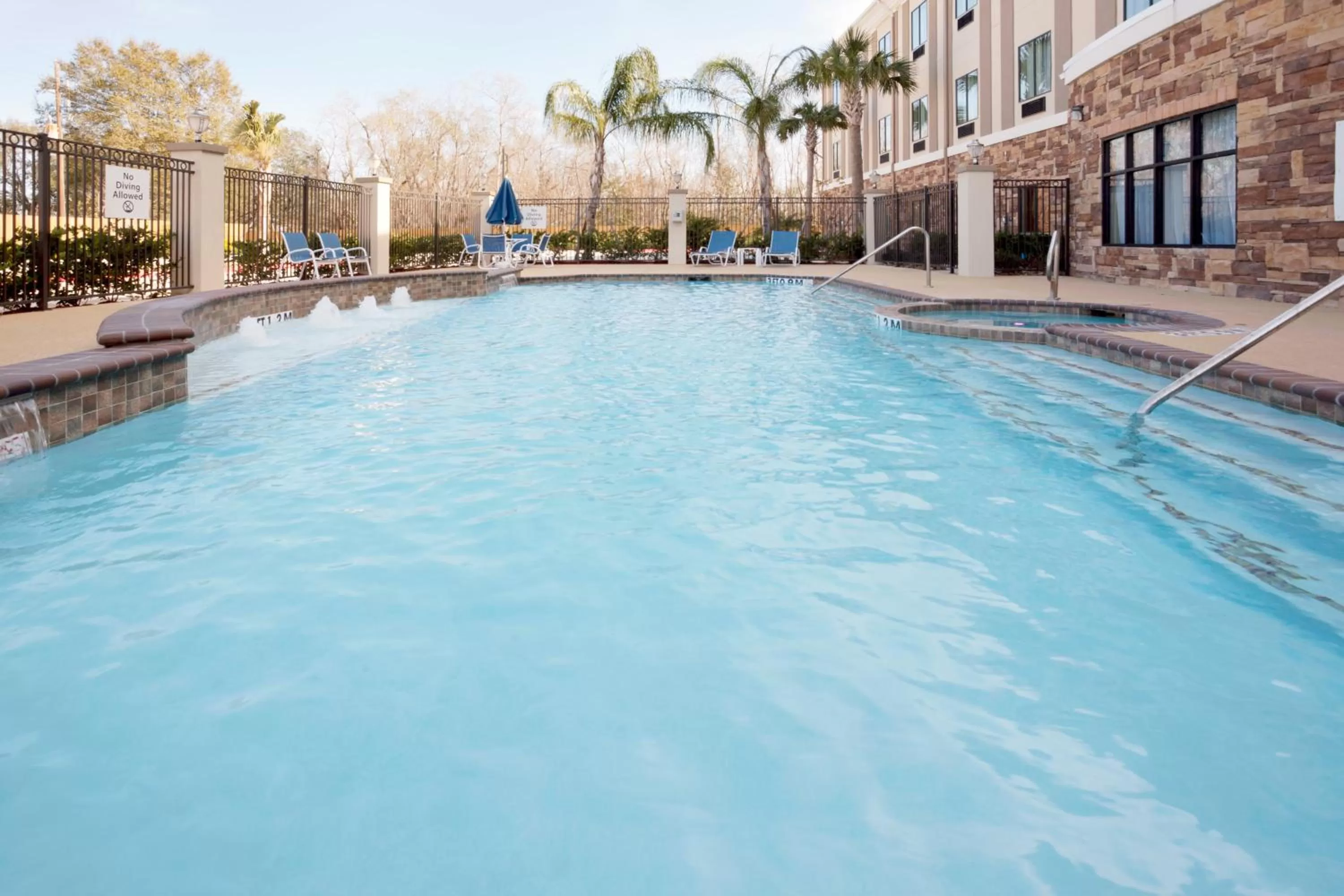 Swimming pool in Holiday Inn Express Hotel & Suites Houston NW Beltway 8-West Road by IHG
