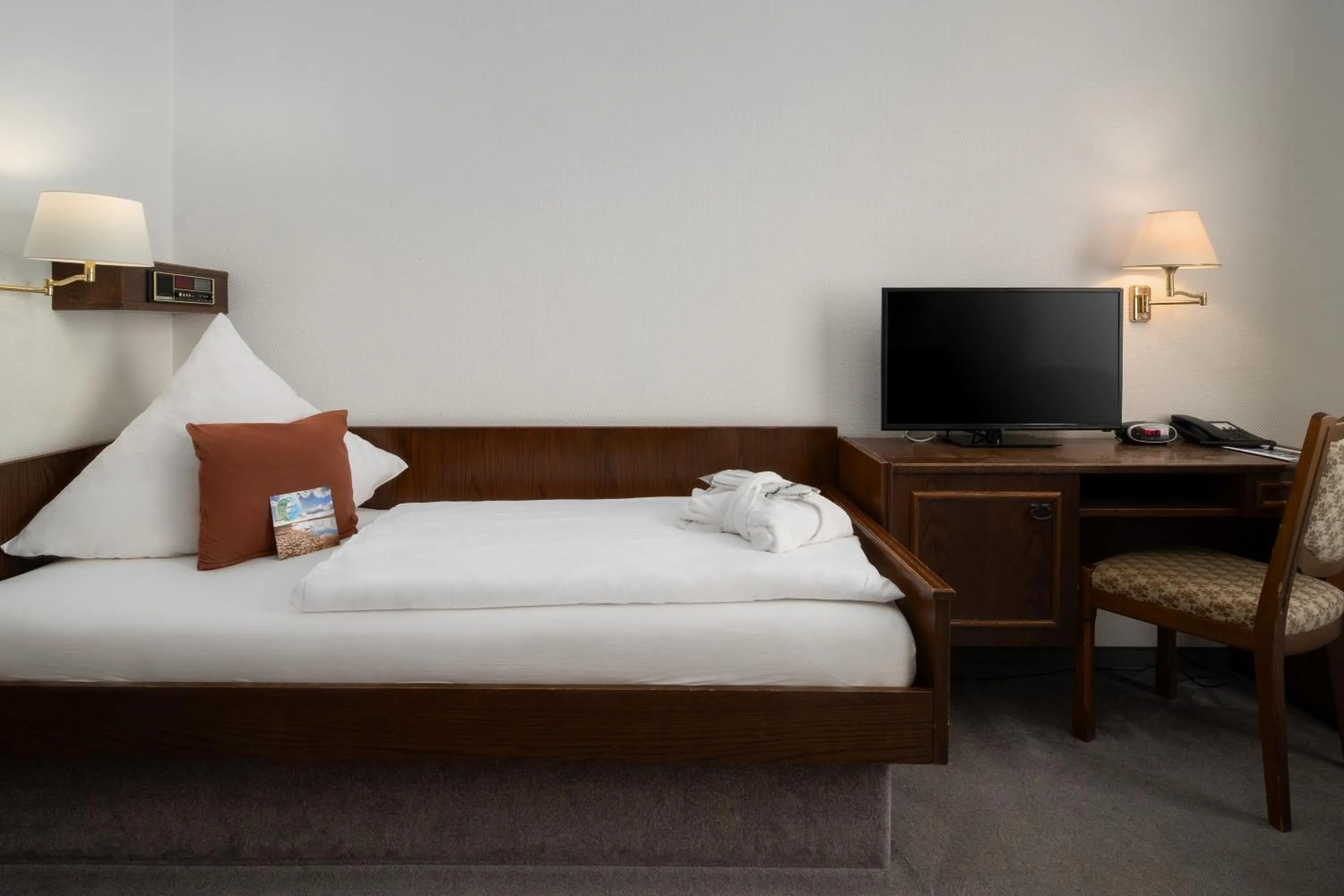 Photo of the whole room, Bed in Nordsee Hotel Borkum