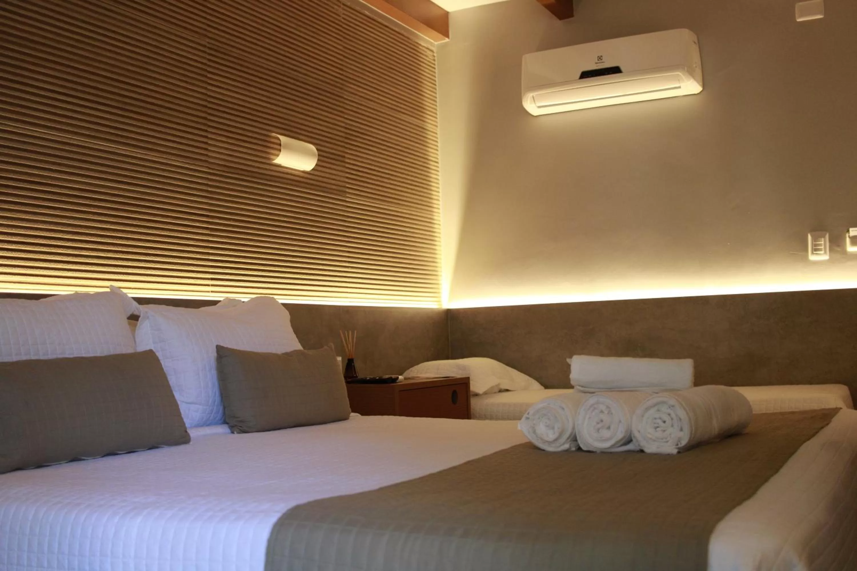 Bed in Pousada Sol e Mar