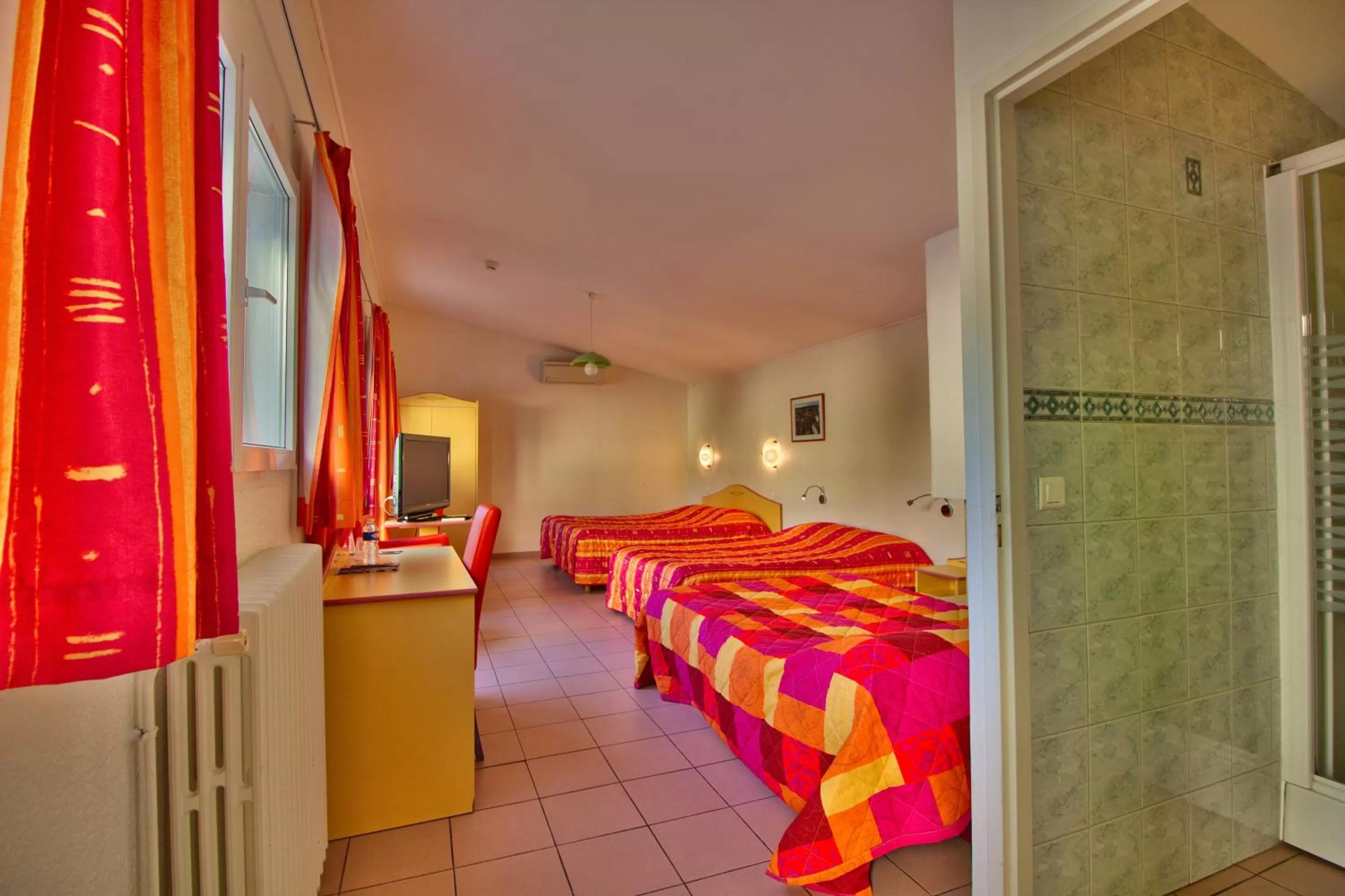 Bed in Logis Hôtel Restaurant Le Chalet du Mont Roland