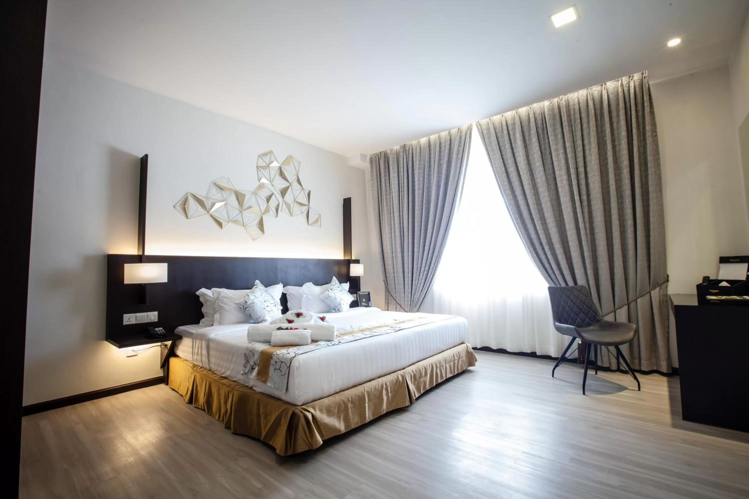 Bed in Amamas Boutique Hotel Kuching