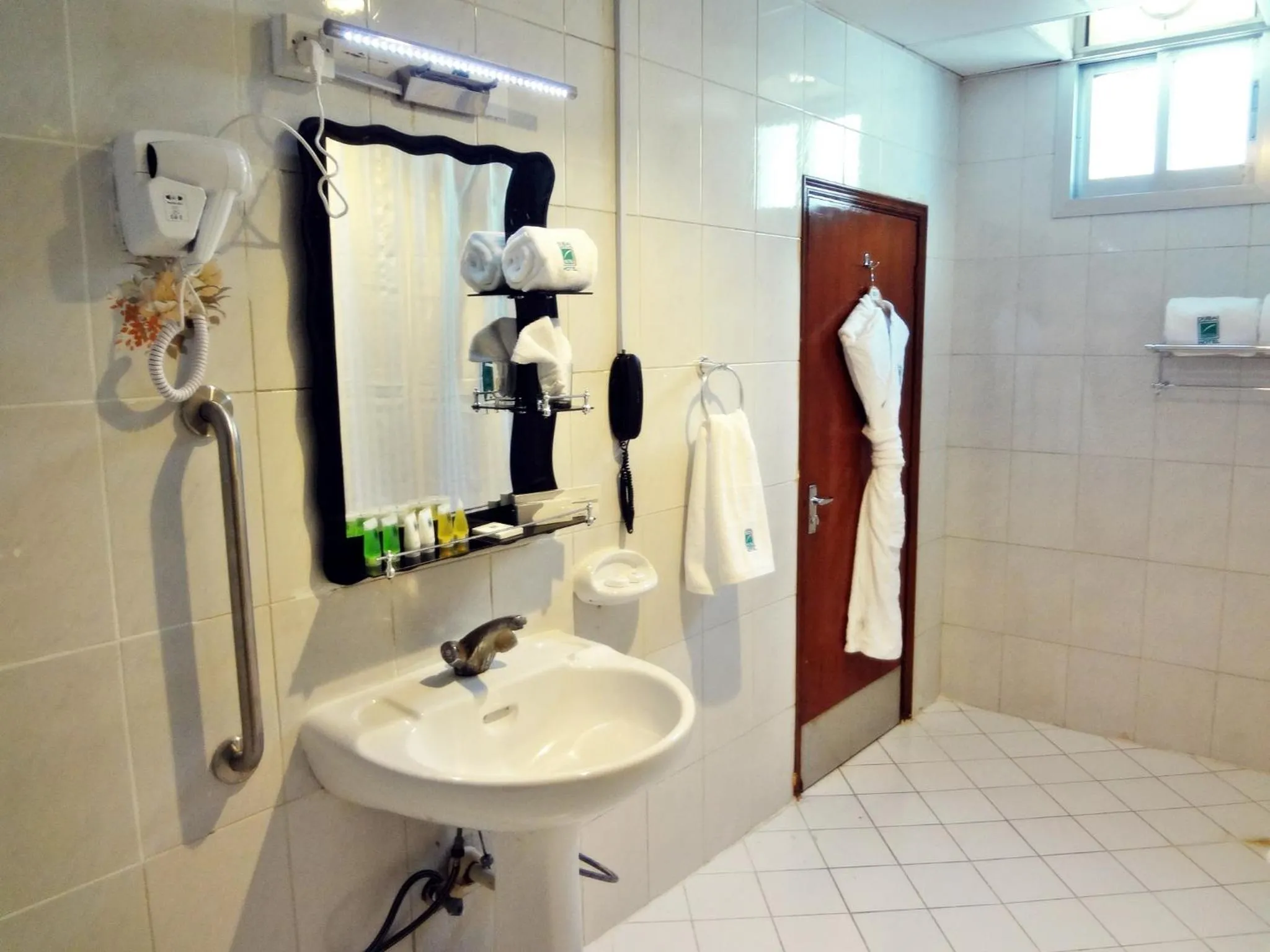 Toilet in Grand Nova Hotel