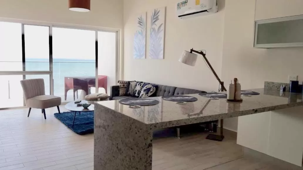 Living room in Playa Caracol Residences