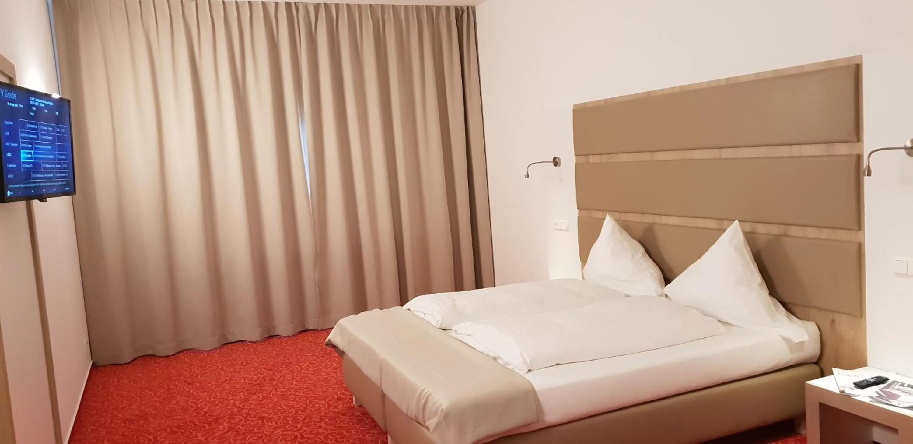 Bed in Confour Hotel