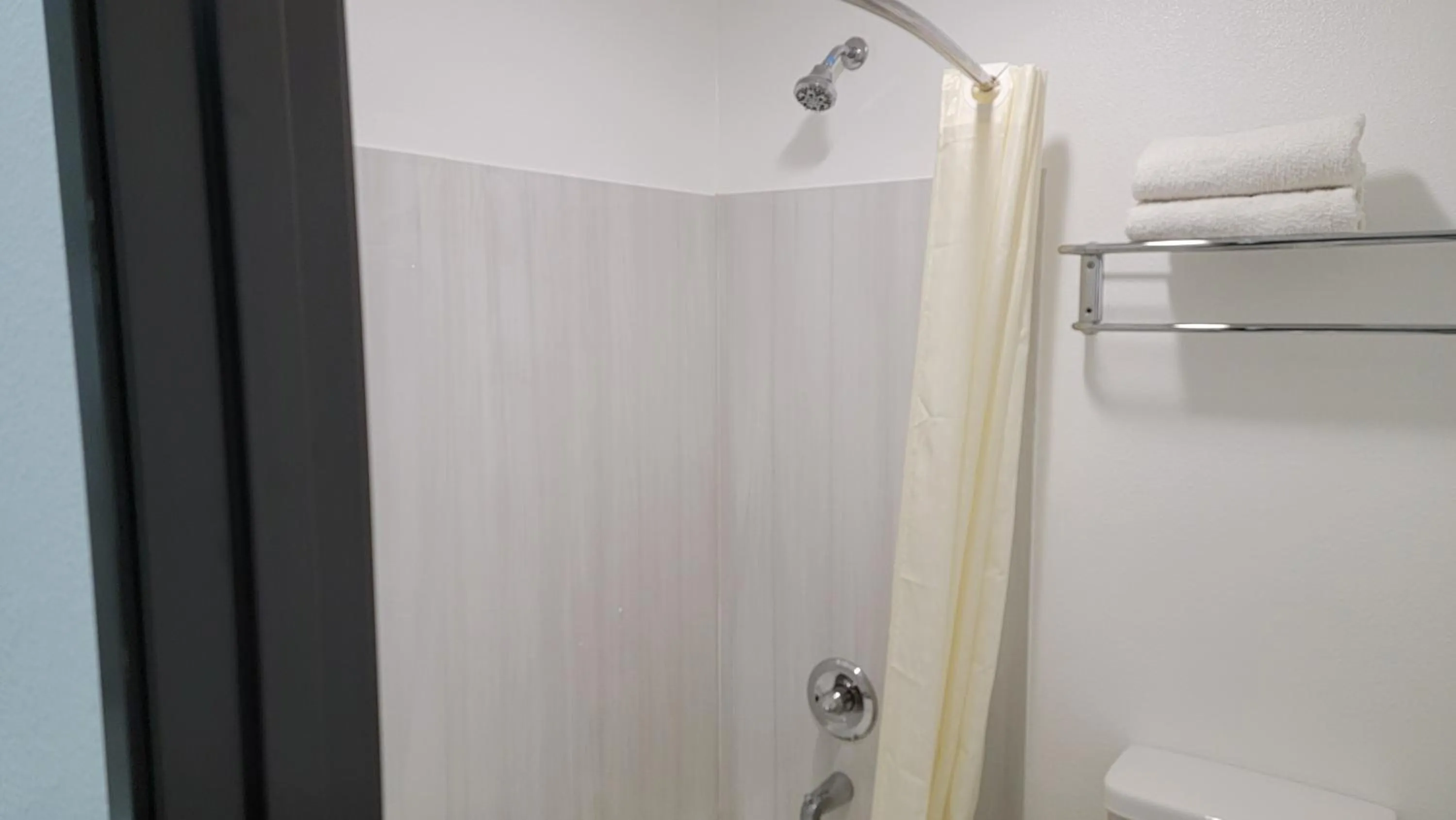 Shower in Travelodge by Wyndham Buena Park